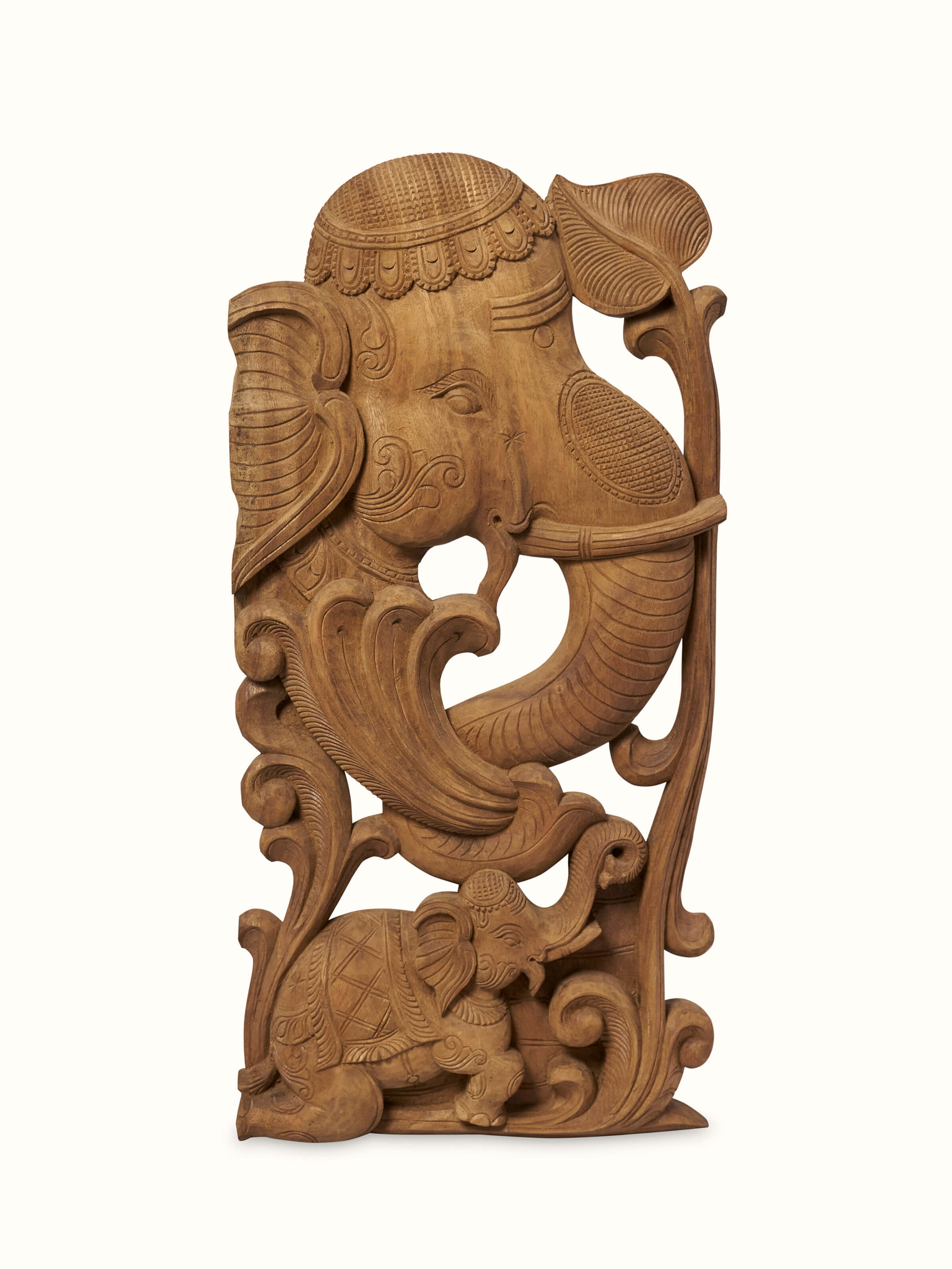 Front view of Tenali Carved Neem Wood Elephant Face Brackets Sculpture (2Pcs) by Swadesh showcasing intricate carving and elegant design.