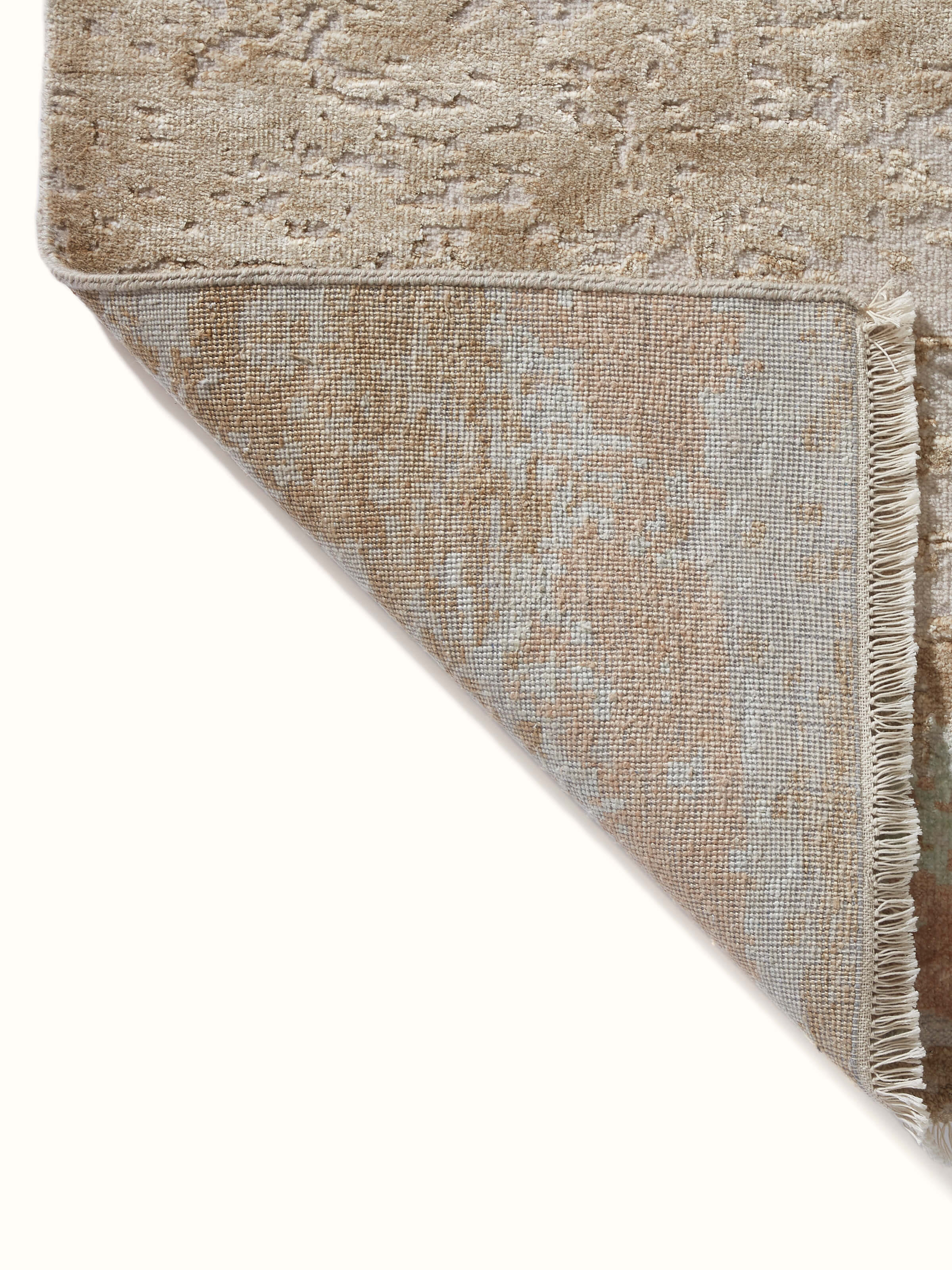 Back view illustrating the hand-knotted construction and durability