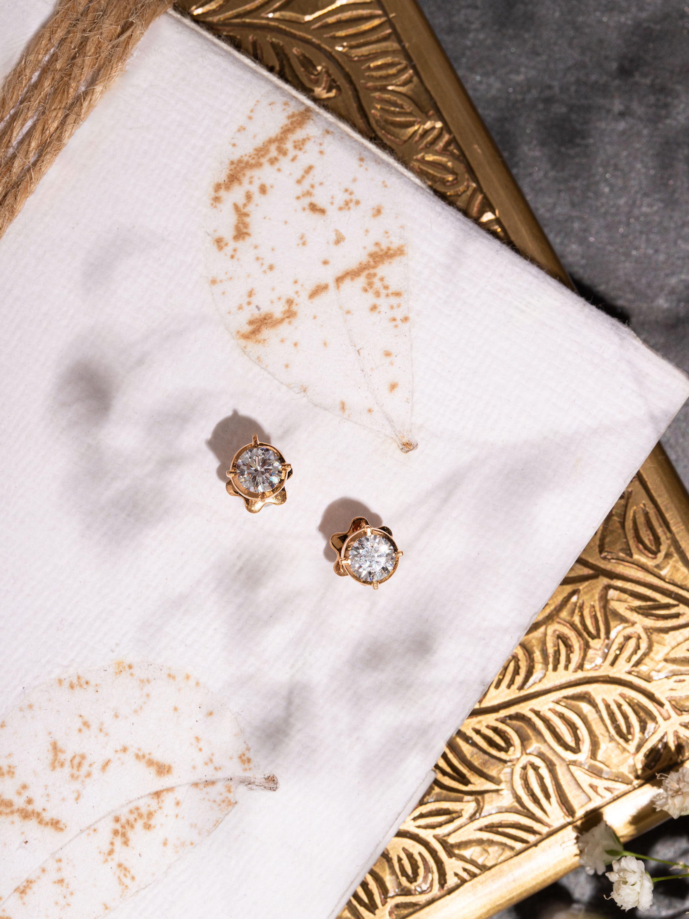 Lifestyle view of Close-setting 22 Karat Gold Studs complementing a festive ethnic look.