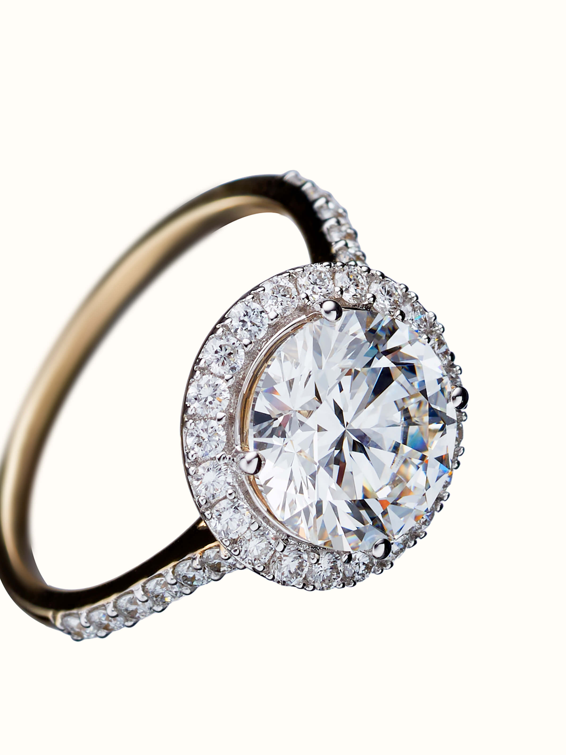 angled view of open setting 14 karat gold ring