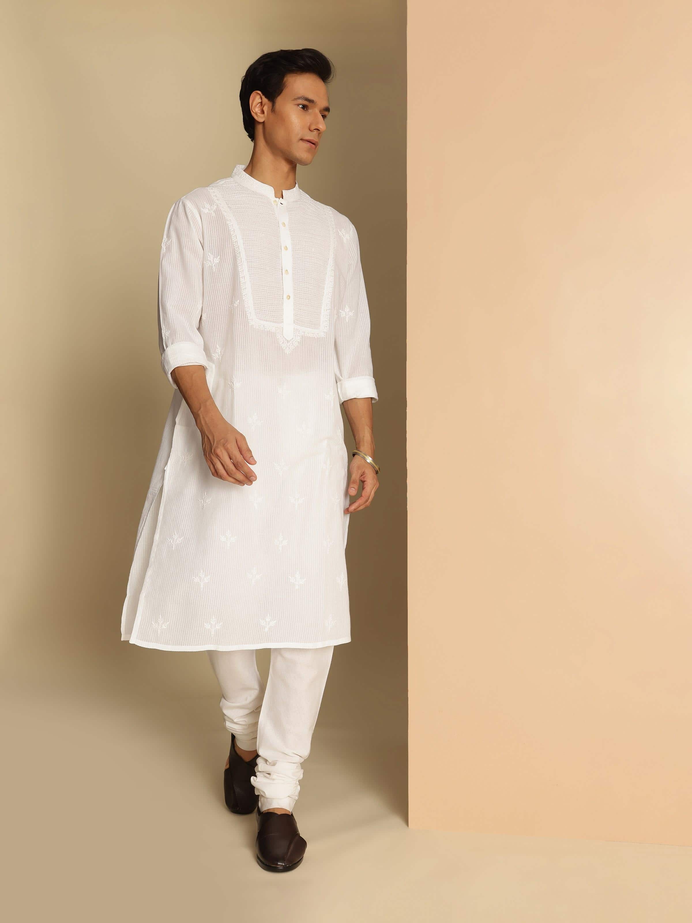 Lifestyle image showing white cotton churidar styled with a kurta, emphasizing a classic ethnic base.