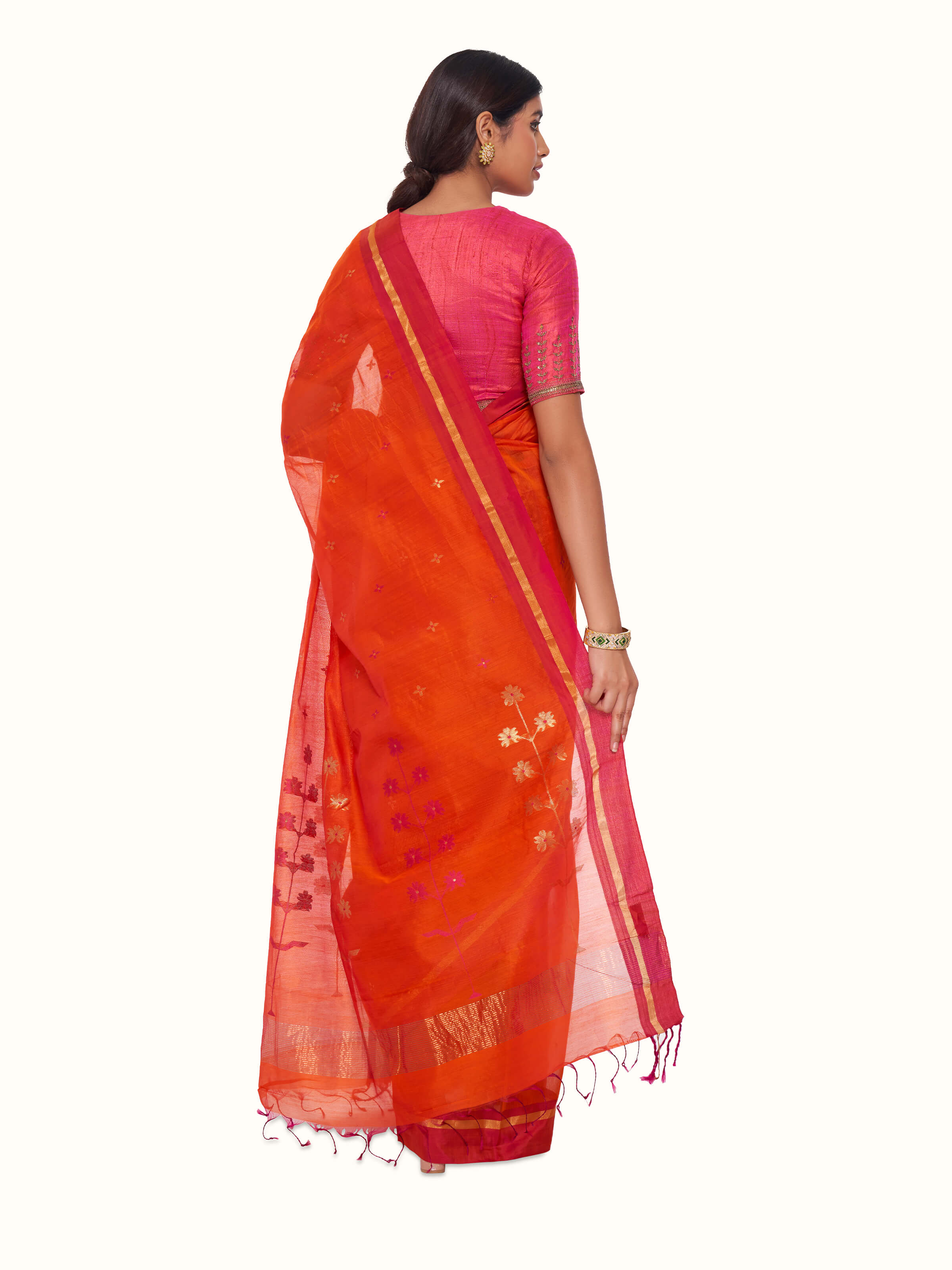 Back view of rust mulberry silk cotton Chanderi saree displaying overall design