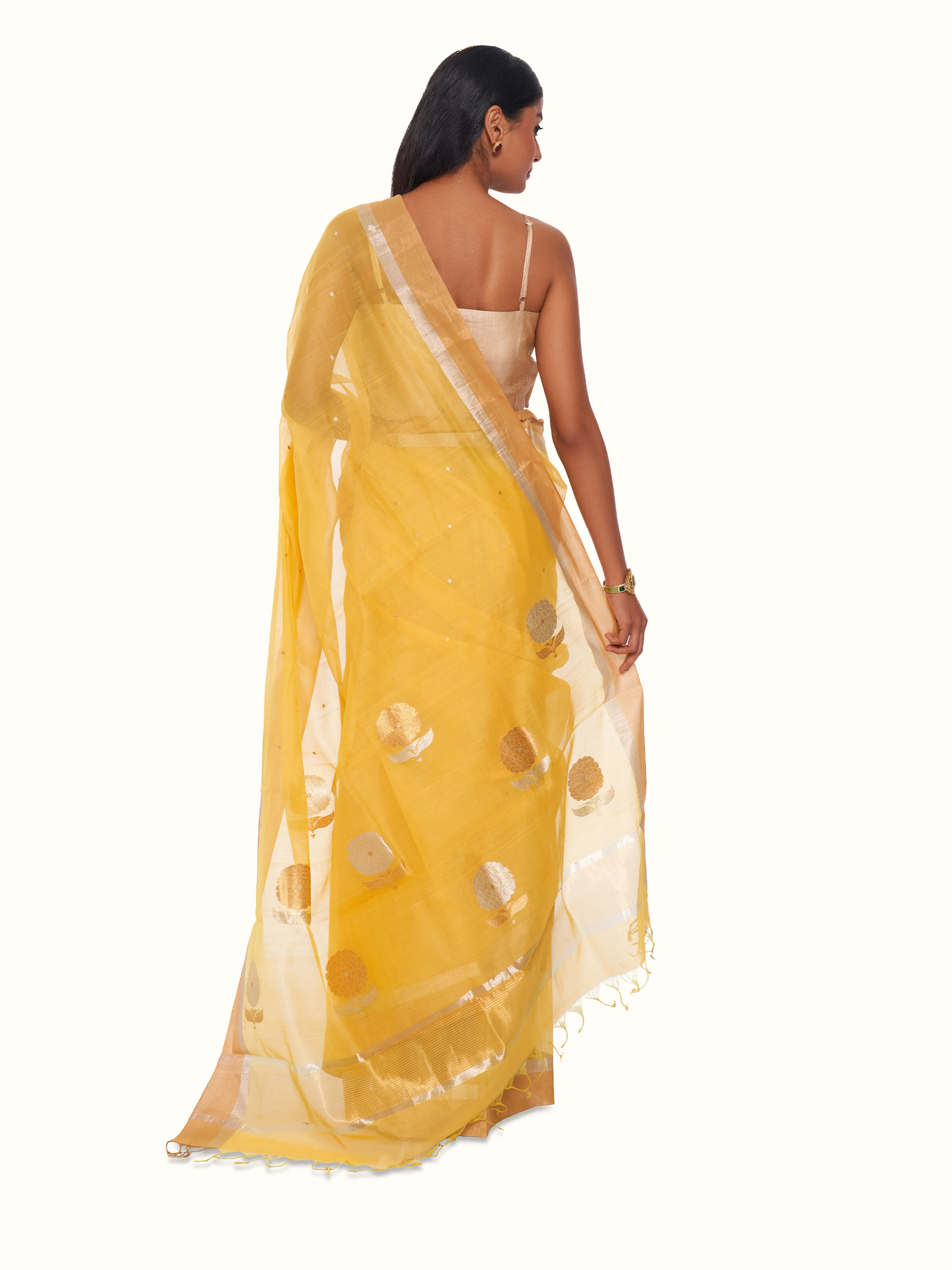 Back view of yellow mulberry silk cotton Chanderi saree displaying pallu design