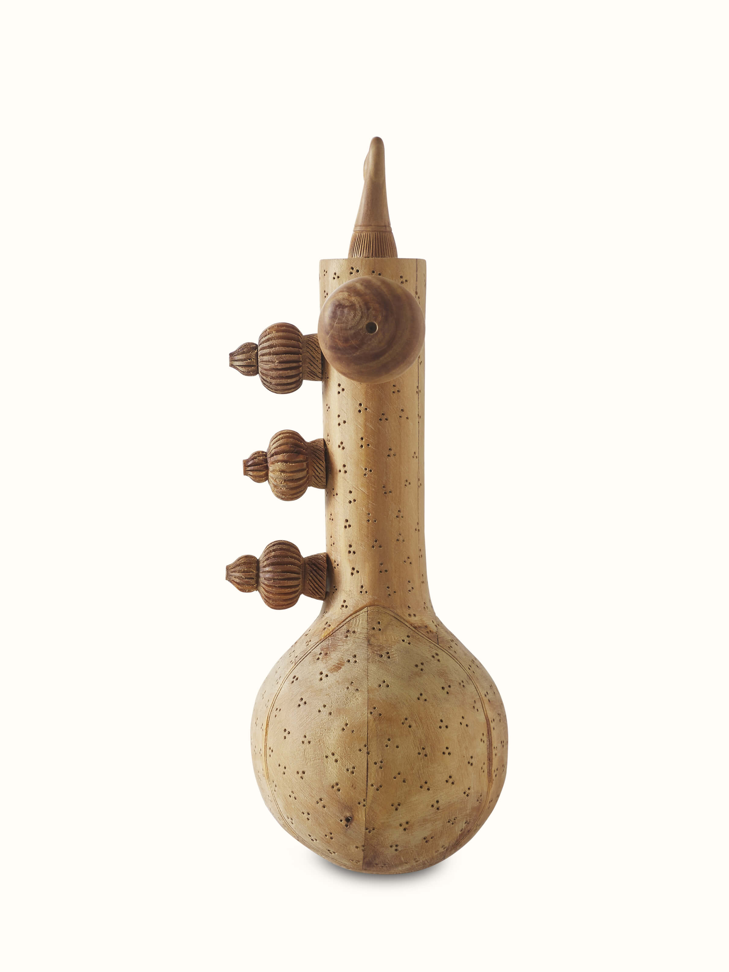 Front view of carved sandalwood Vandana Veena sculpture showing its artistic design