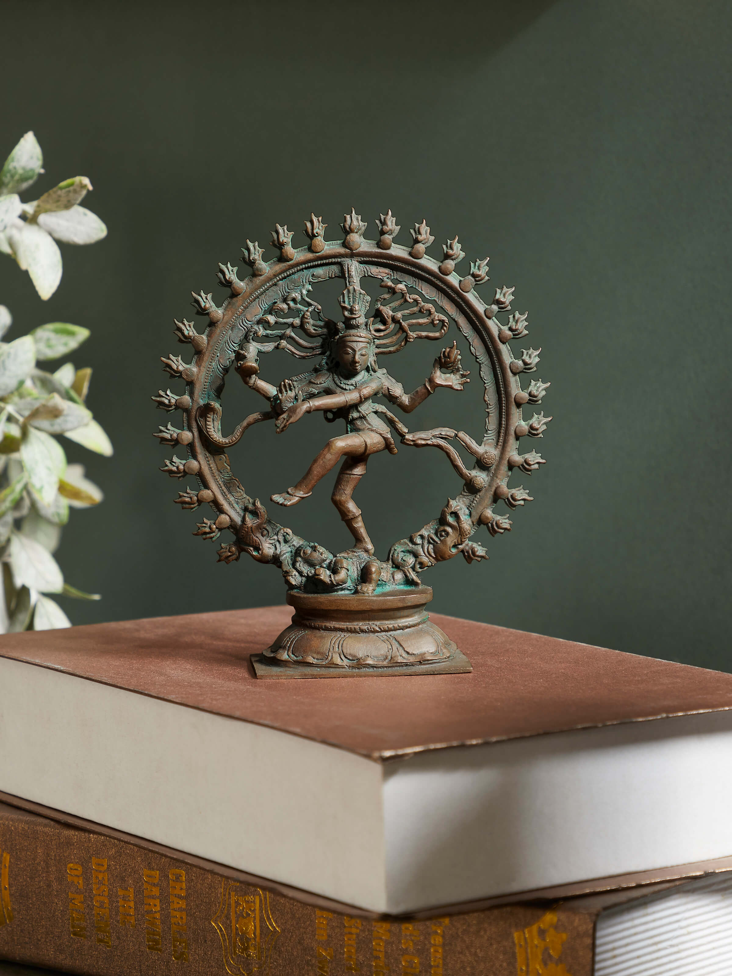 Side view of Mystical Natraja antique sculpture highlighting the dynamic pose and finely detailed craftsmanship.