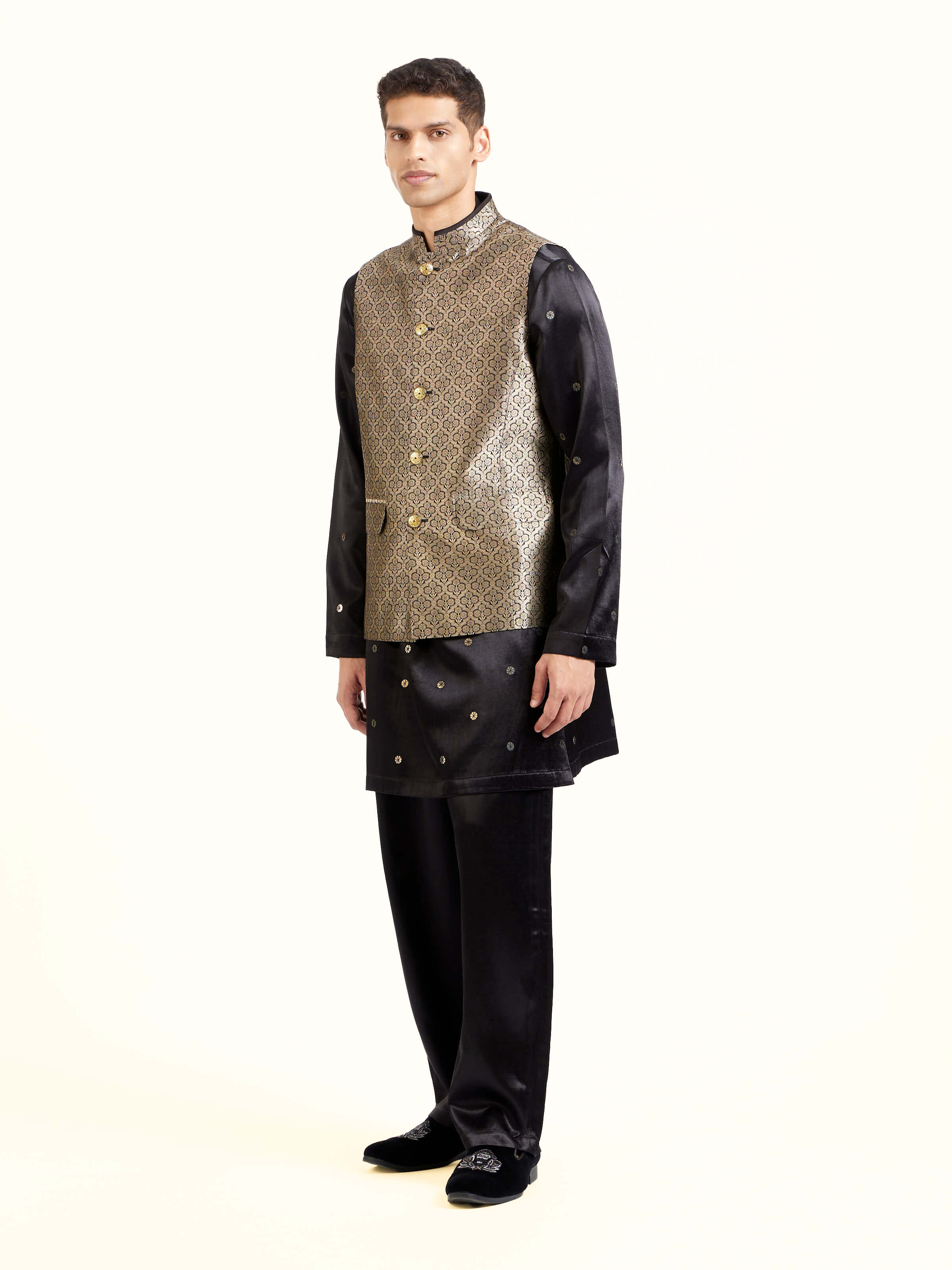 Side view of black silk Banarasi sleeveless jacket showcasing tailored fit