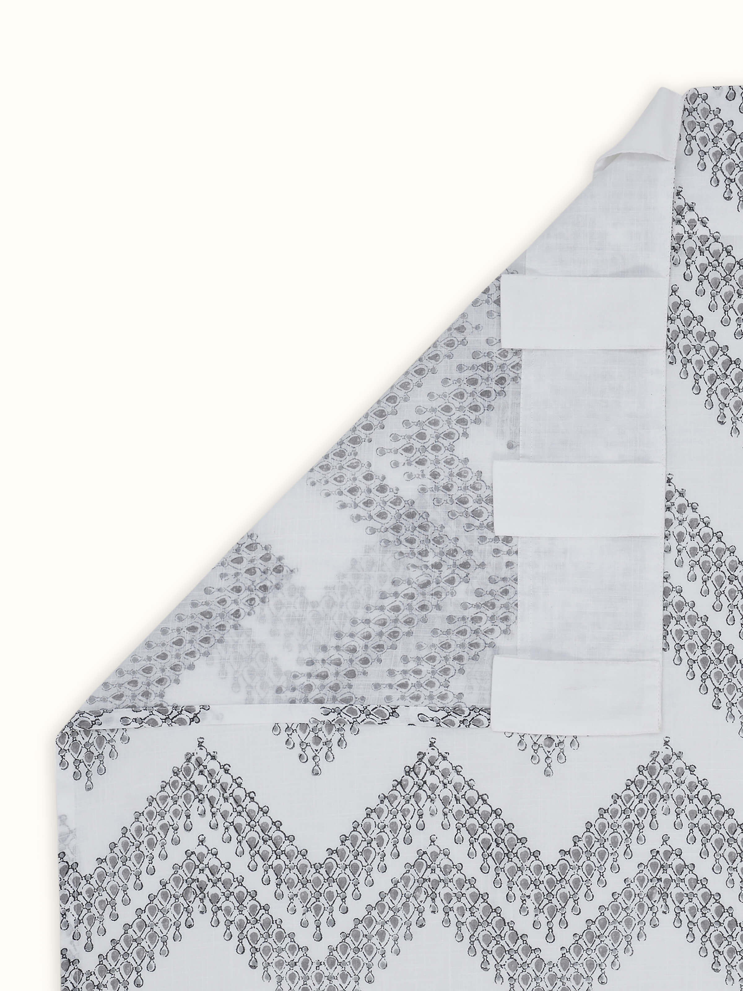 Back view highlighting neat finish and hemline of cotton curtain.