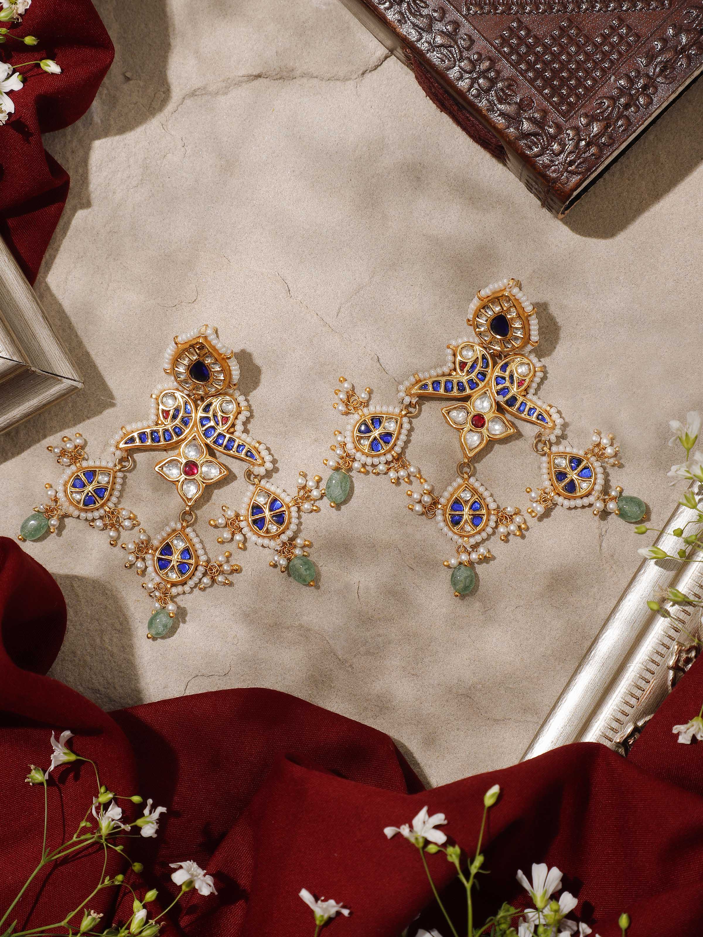 Angled lifestyle image highlighting layered discs and oxidized silver finish