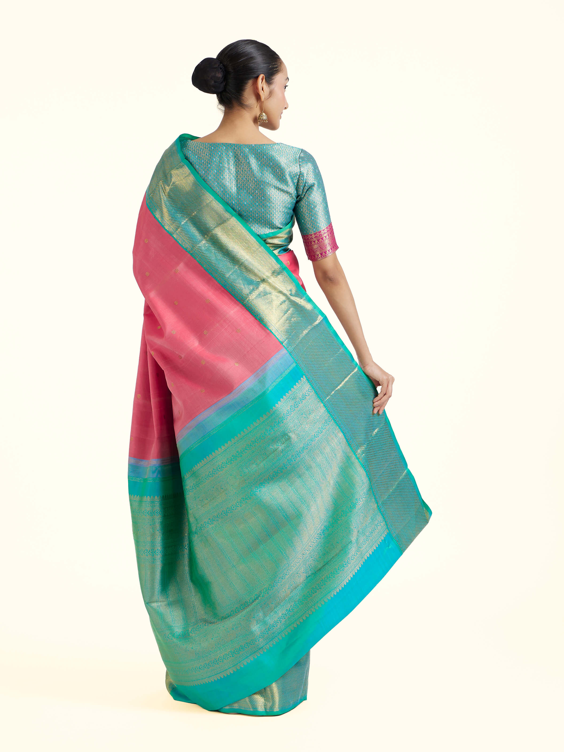 Back view of wine silk Kancheepuram saree displaying ornate pallu design