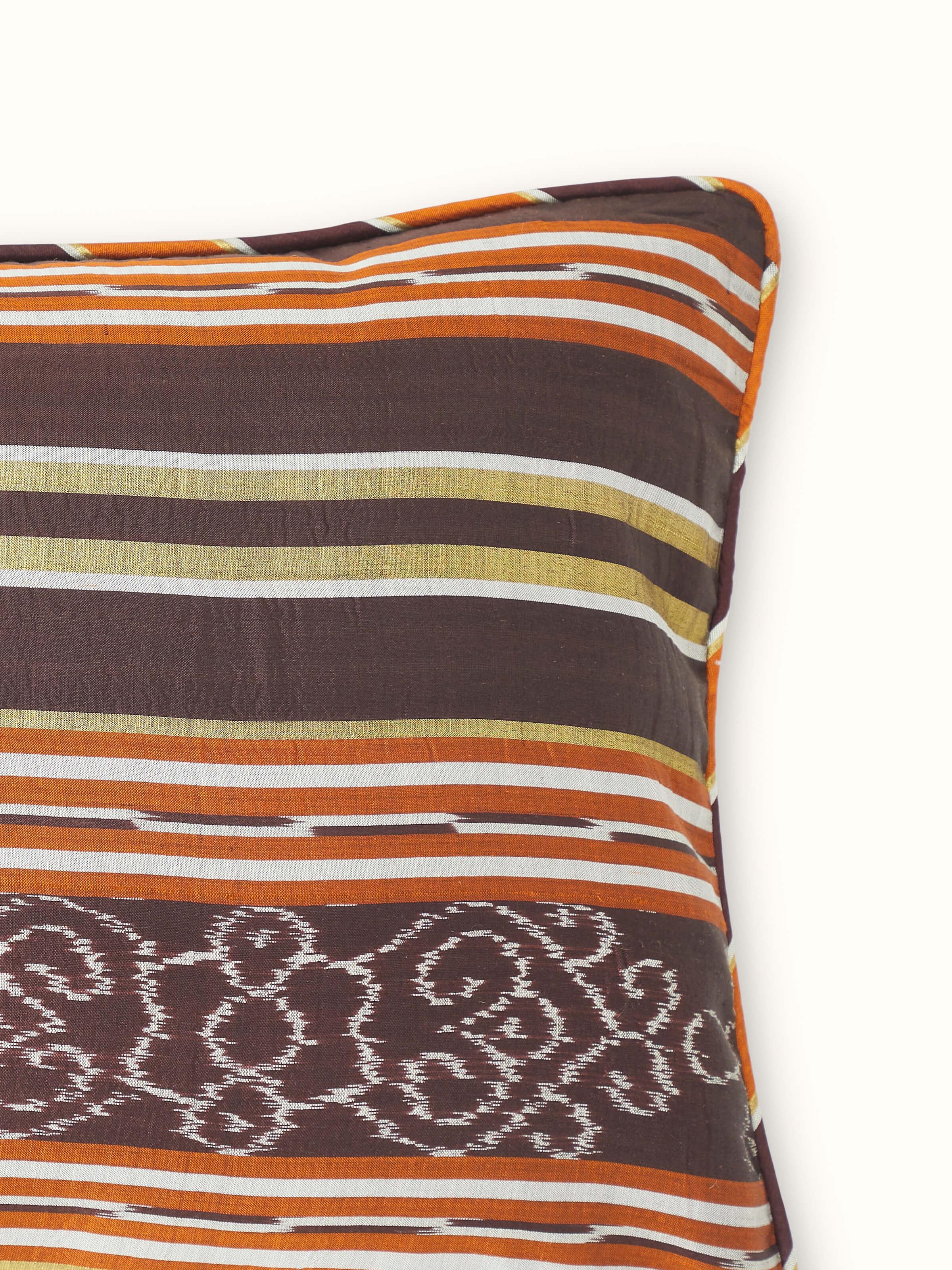 Close-up showing the silk fibers and craftsmanship of the handloom Ikat design