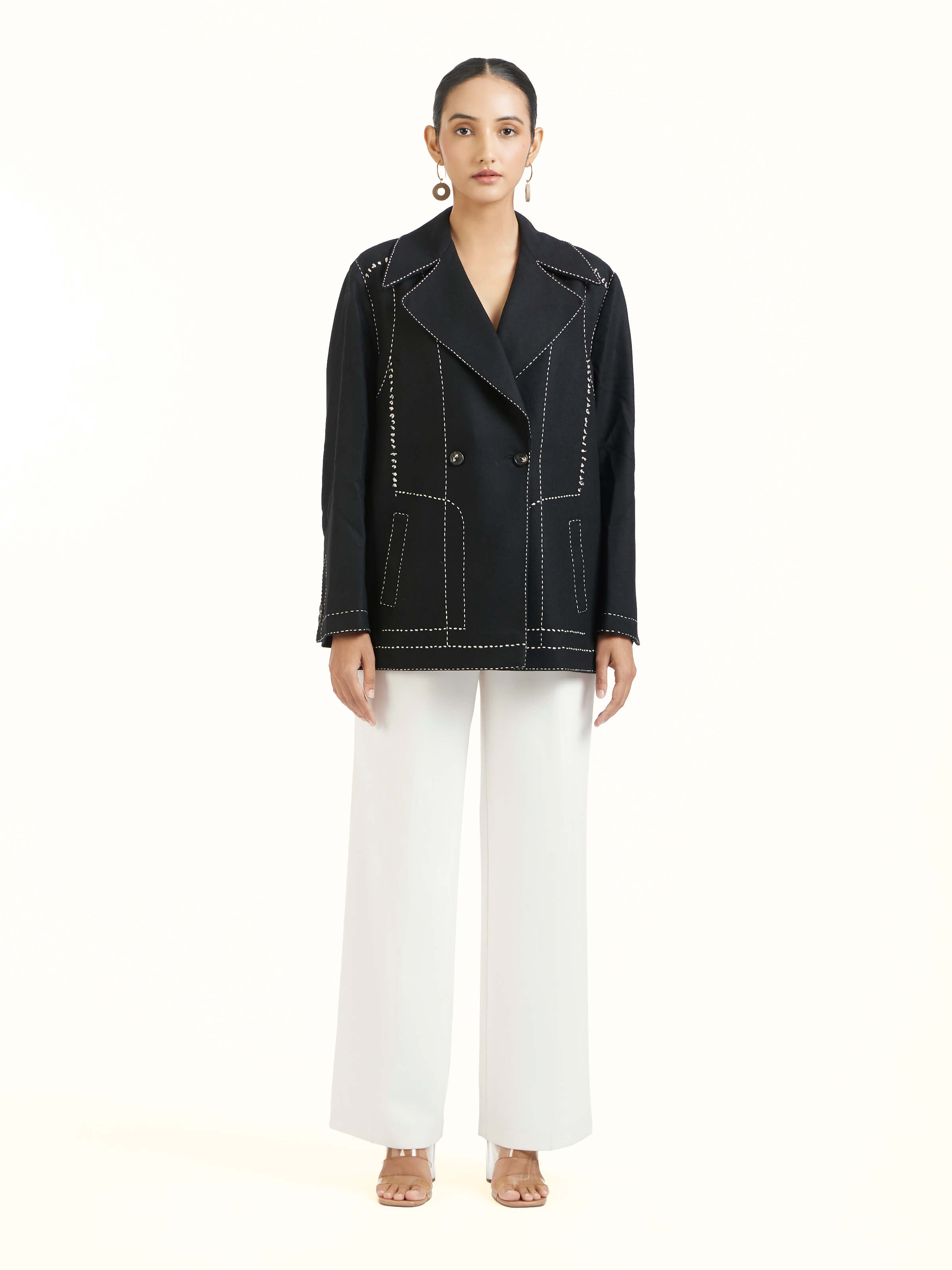 Front view of black wool kantha jacket with hand-stitched embroidery details