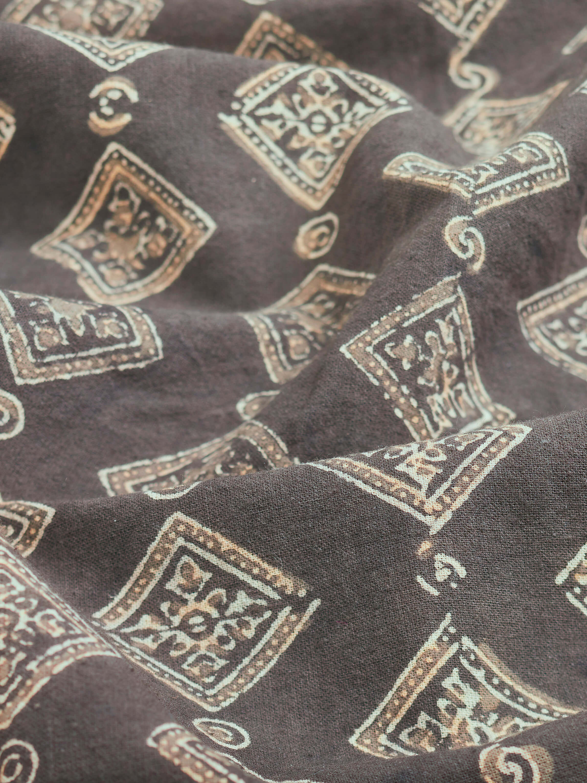 Close-up view of Sindh dark brown jaal cotton ajrakh block printed queen bedspread set (3 pcs) emphasizing the texture and intricate design.