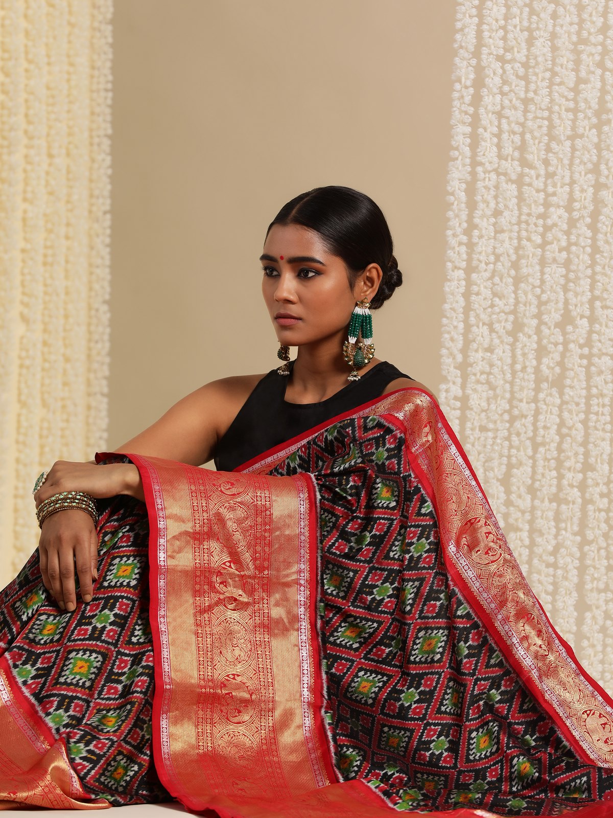 Close-up showing Ikat weave precision and vibrant blue silk finish.