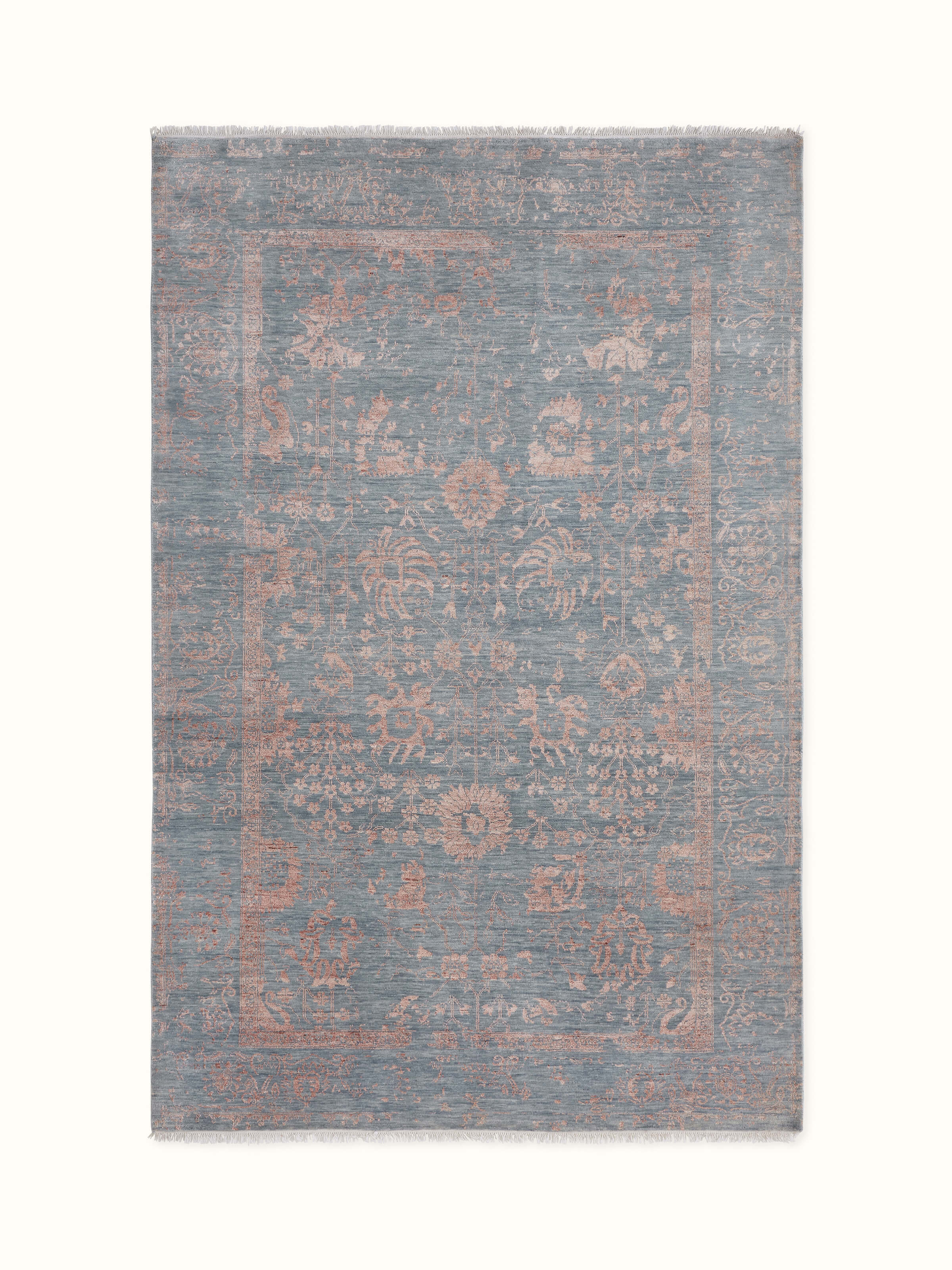Distressed transitional hand-knotted carpet in soft grey and beige tones, made of wool and viscose – front view