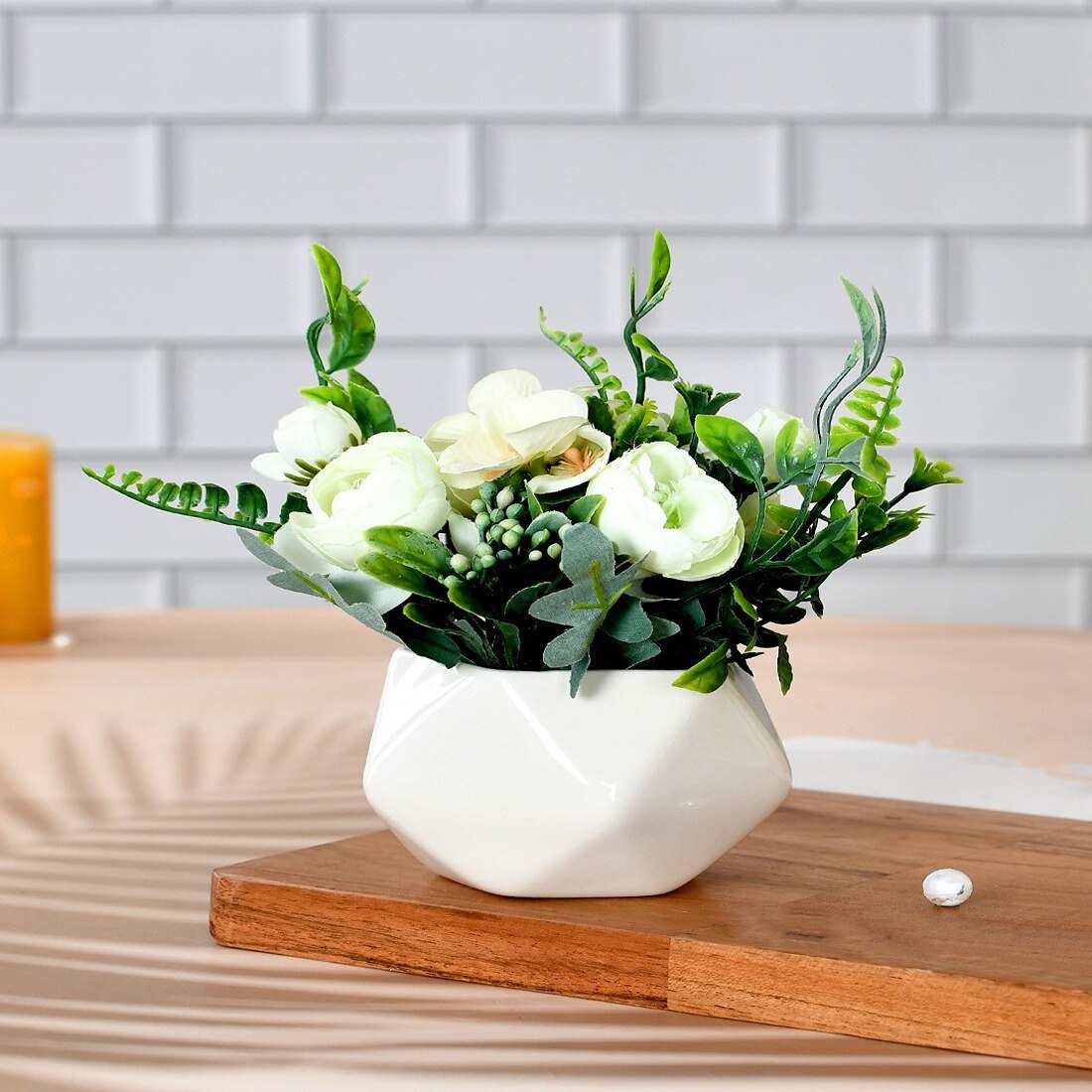 Pristine White Flowers In A Diamond Pattern Planter
