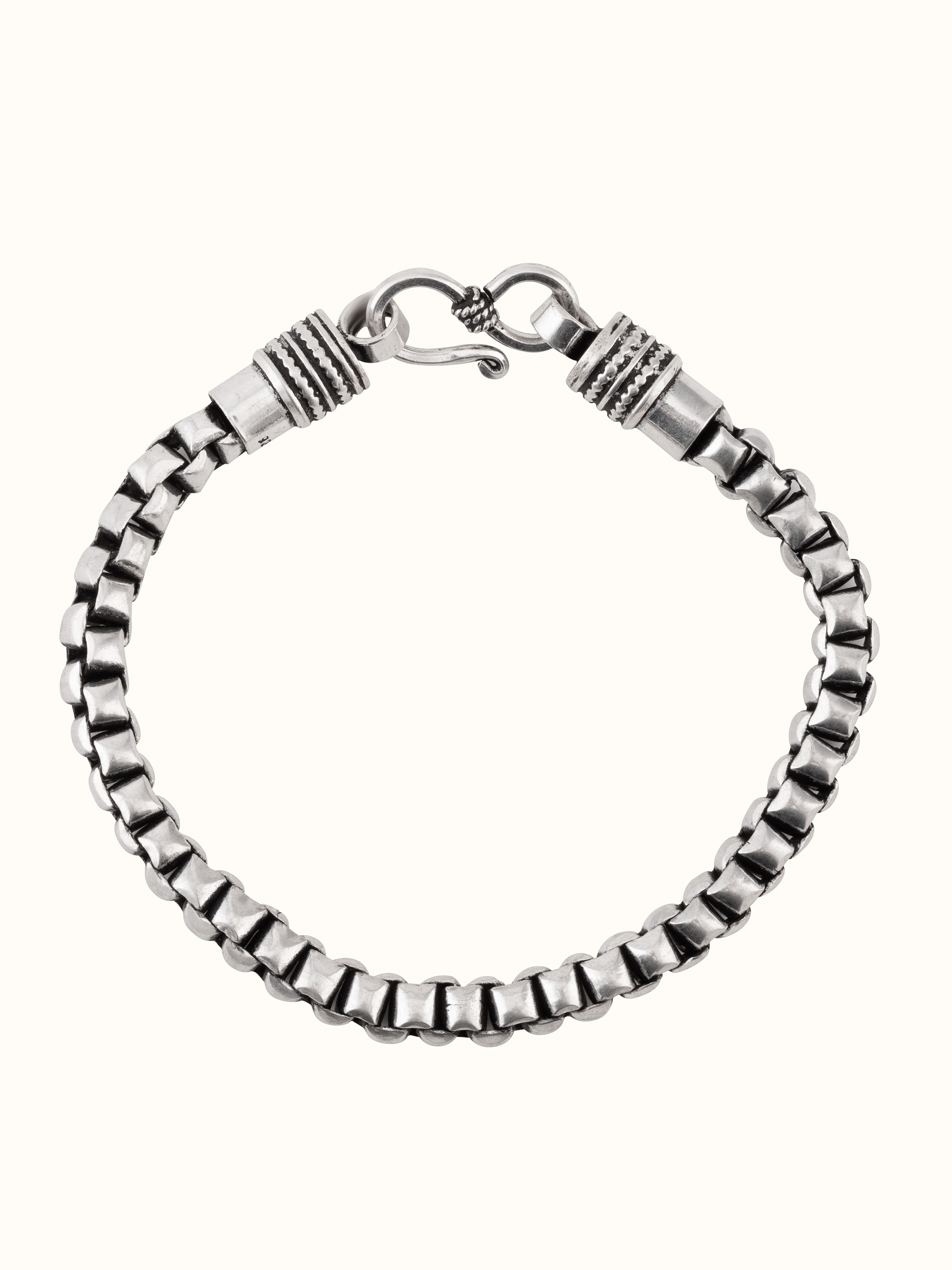 Front view of silver smithing men’s flexi bracelet with structured handcrafted links