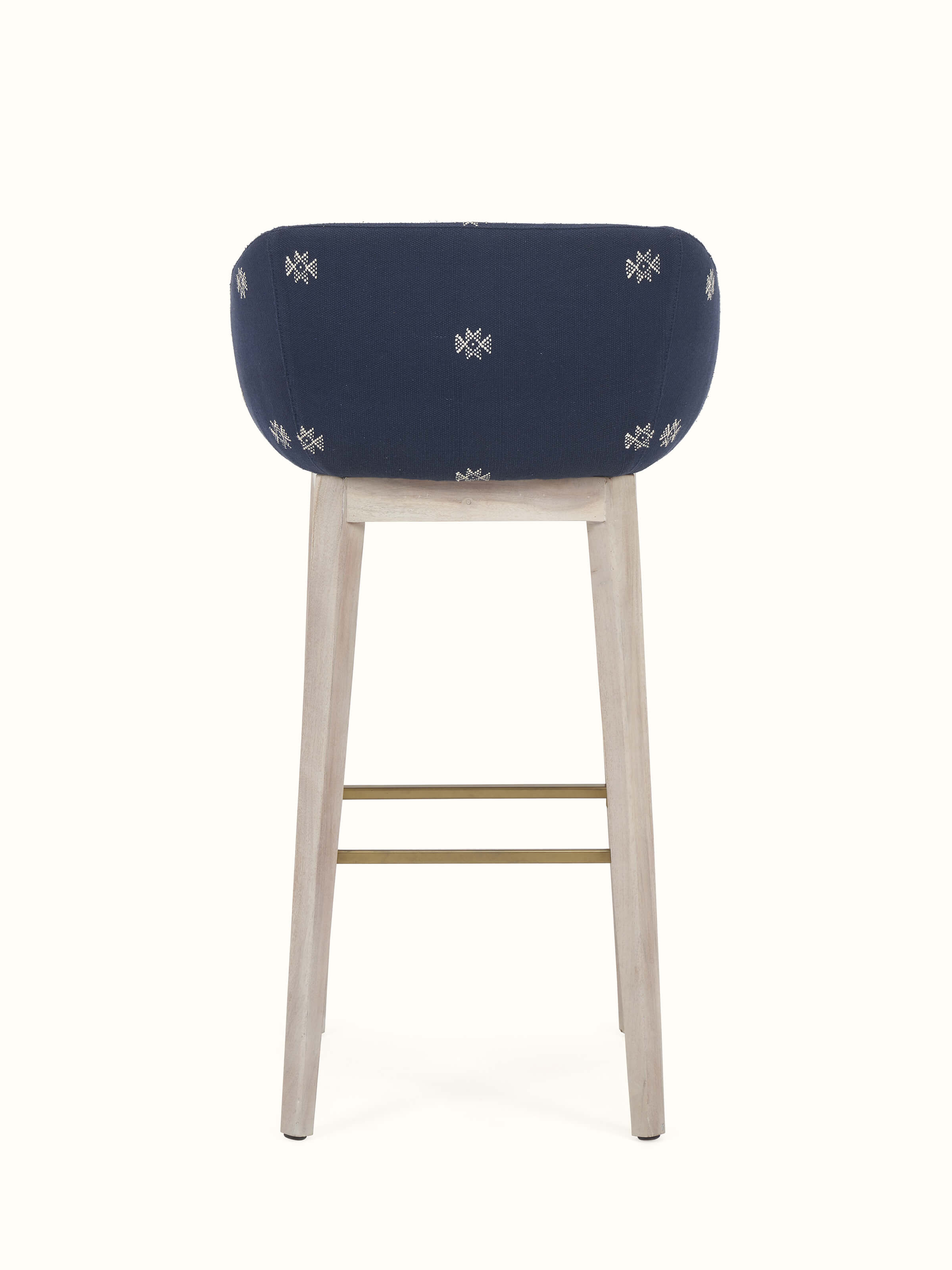 Close-up view showcasing the fine details of the upholstered acacia wood bar chair.