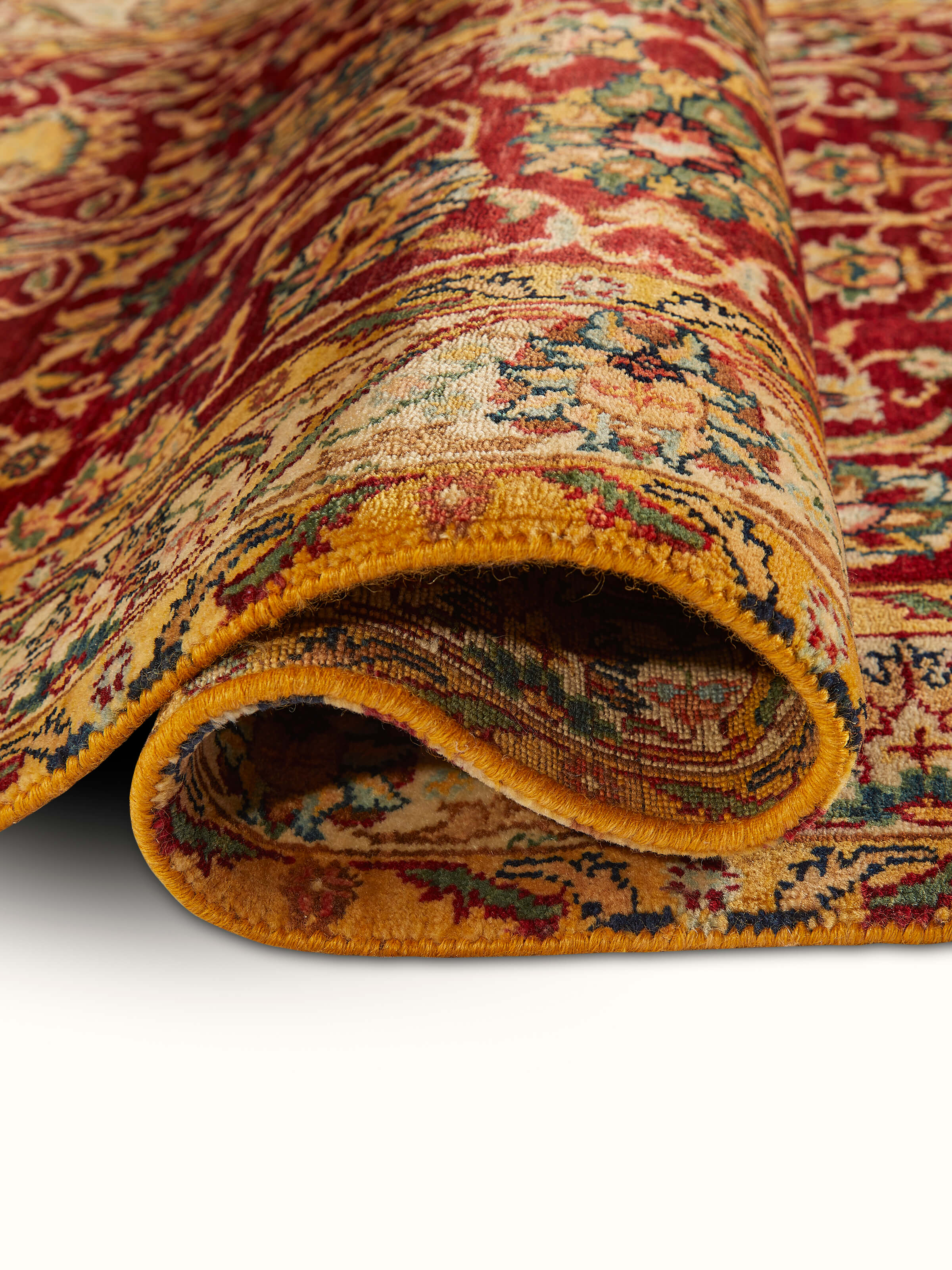 Close-up of Ziegler traditional red Jaipur wool hand-knotted carpet highlighting the detailed patterns and fibers
