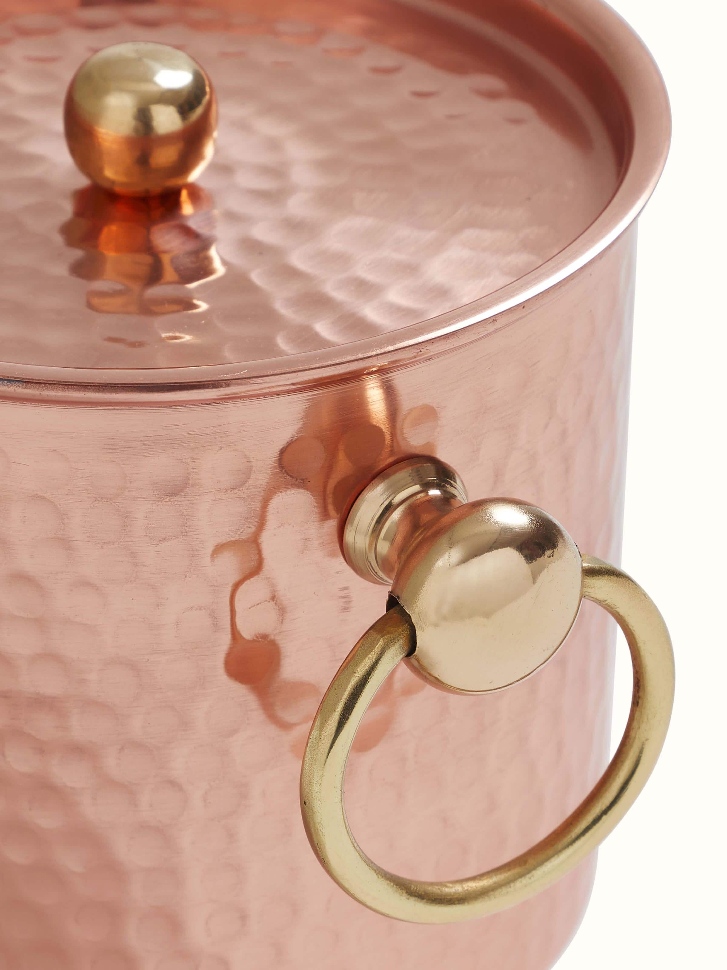 Detailed view of Copper Ice Bucket by Swadesh showcasing the fine craftsmanship and durable handle design.