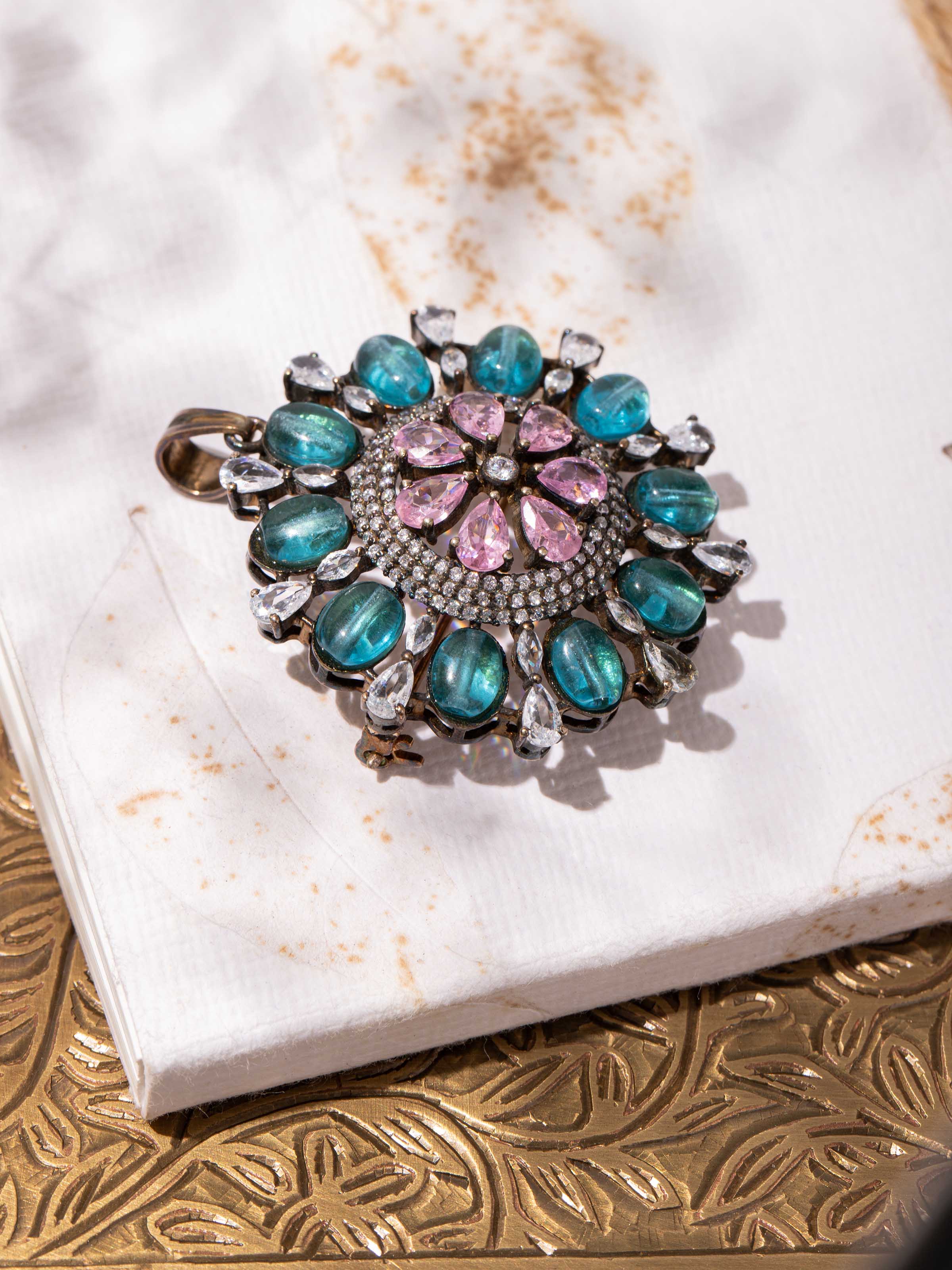 alternate lifestyle view of silver smithing yellow gold brooch pin