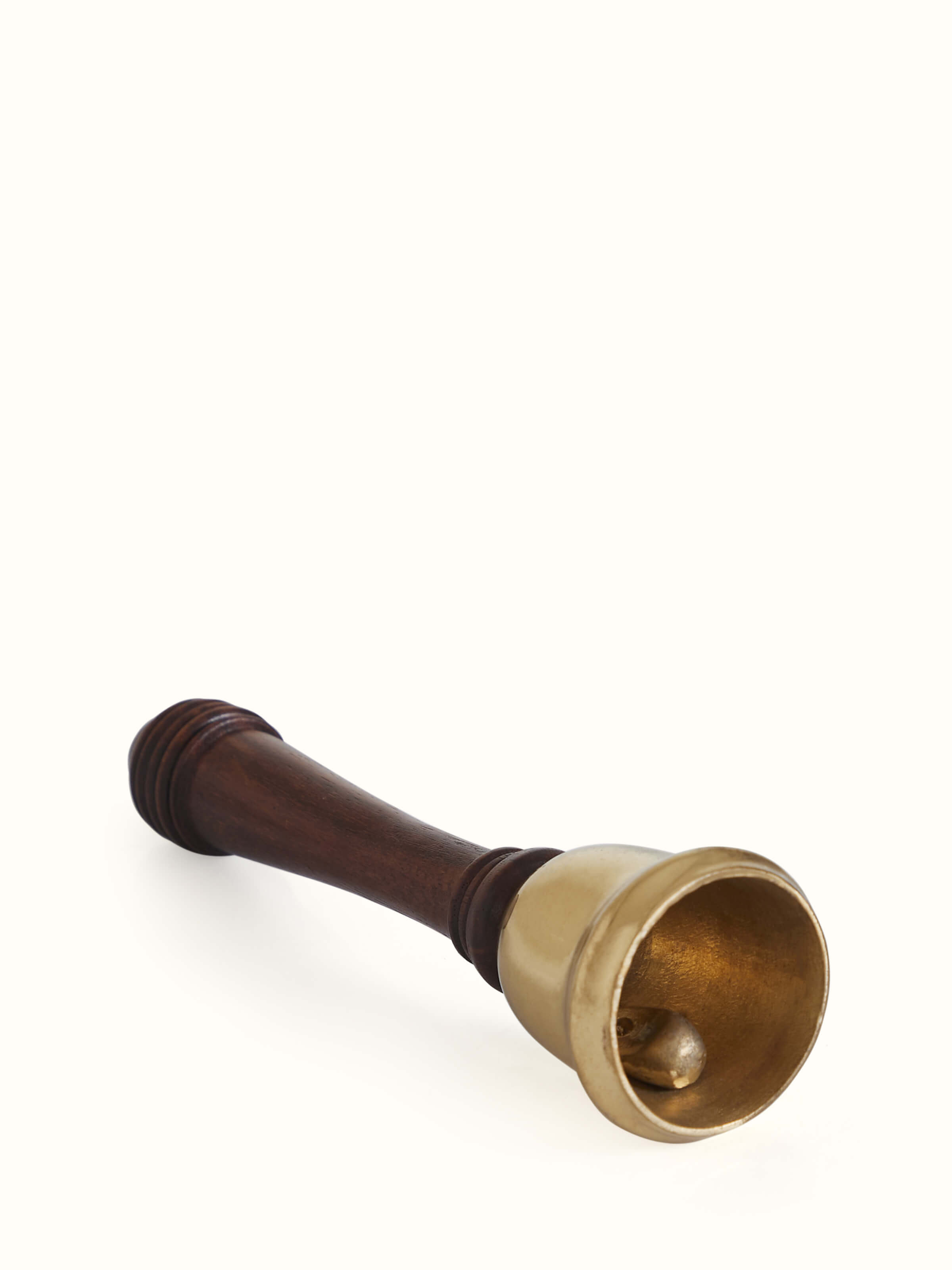 Decorative lacquered brass pooja bell in Thathera craft style – angled view