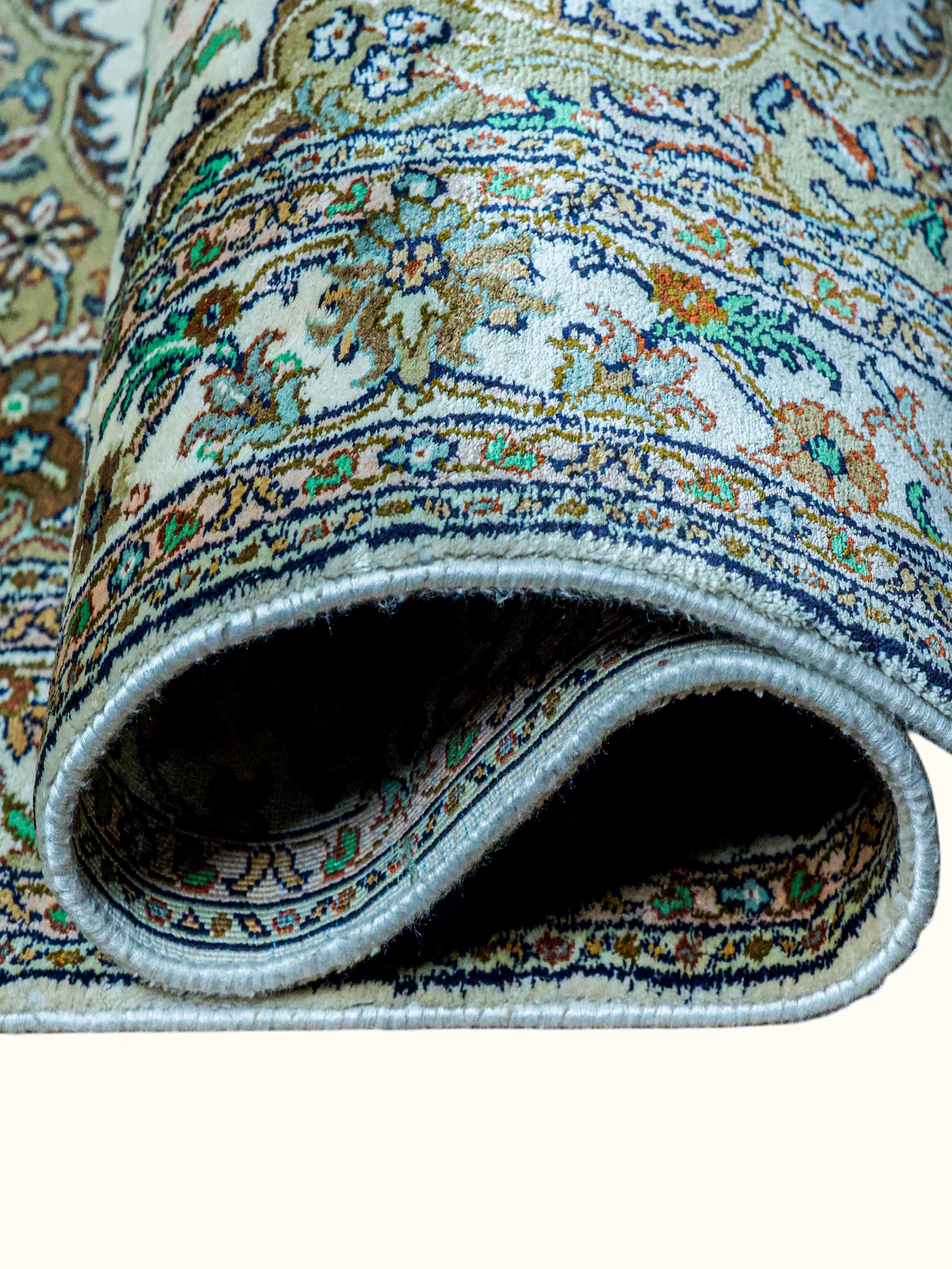 Close-up of the Traditional Persian Ivory Green Kashan Kashmir Silk Hand-Knotted Carpet