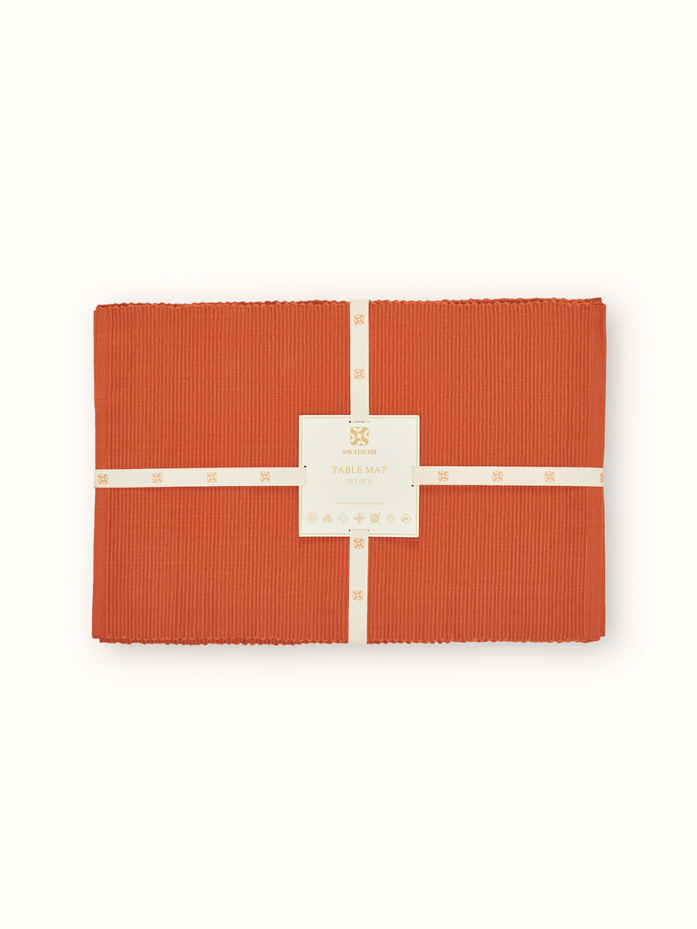 Close-up highlighting the fine handloom weave and rich rust hue