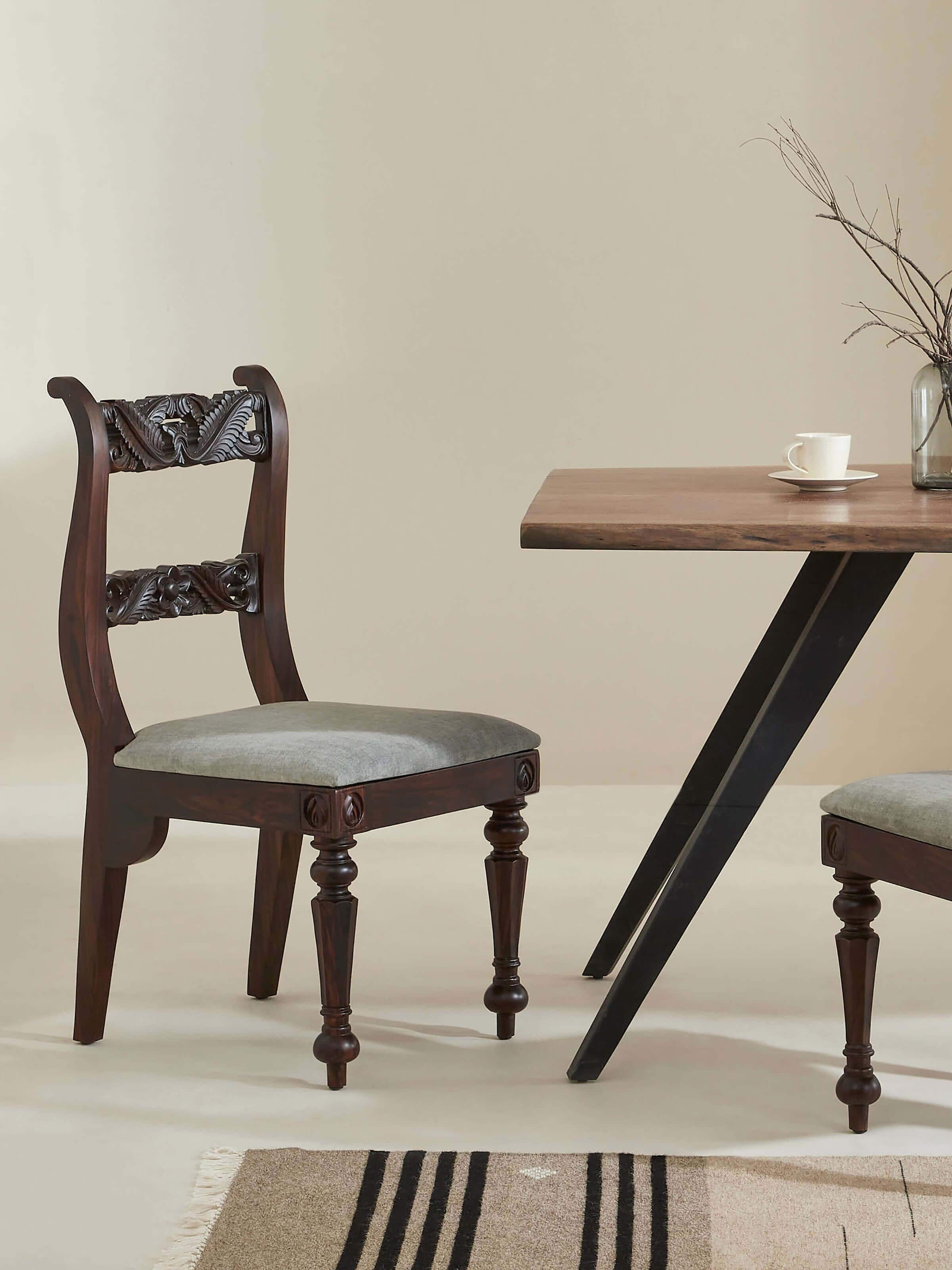 Side view of upholstered carved rosewood dining chair (set of 2) showcasing fine craftsmanship and luxurious upholstery for elegant dining.
