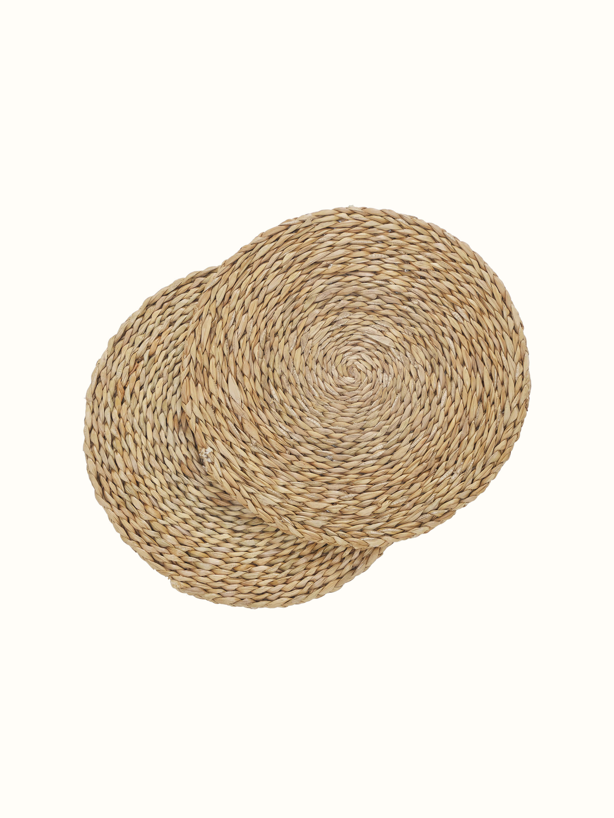 Front view of Vritti Brown Solid Round Natural Fibre Hogla Pata Trivets (2 Pcs) by Swadesh