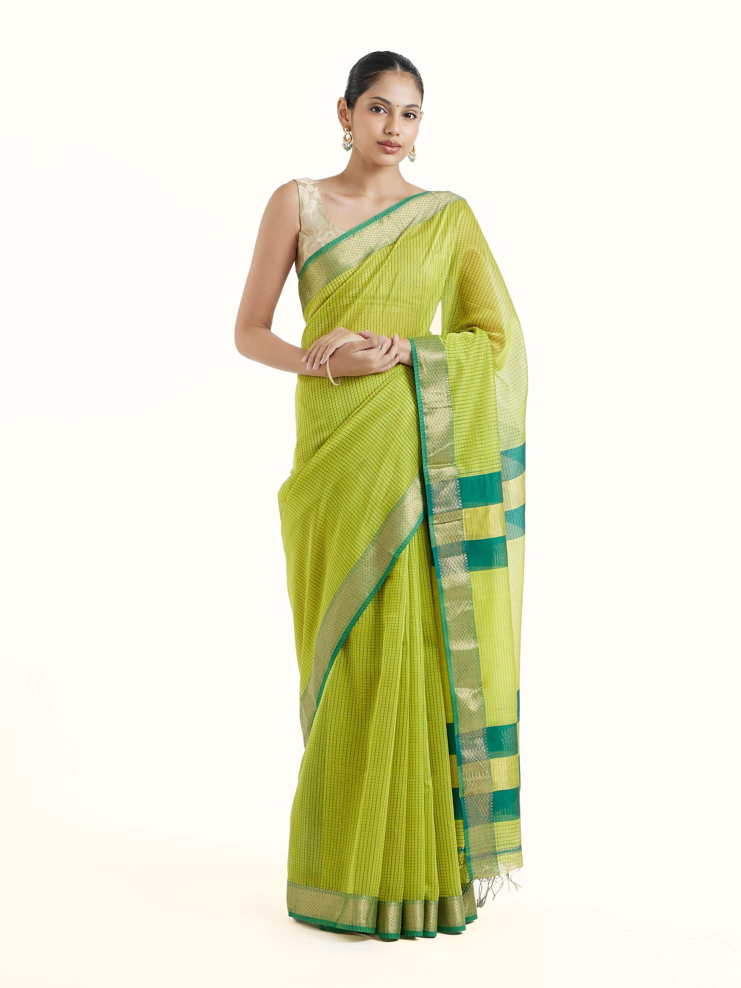 Front view of green cotton silk Maheshwari saree showcasing traditional motifs and rich colour