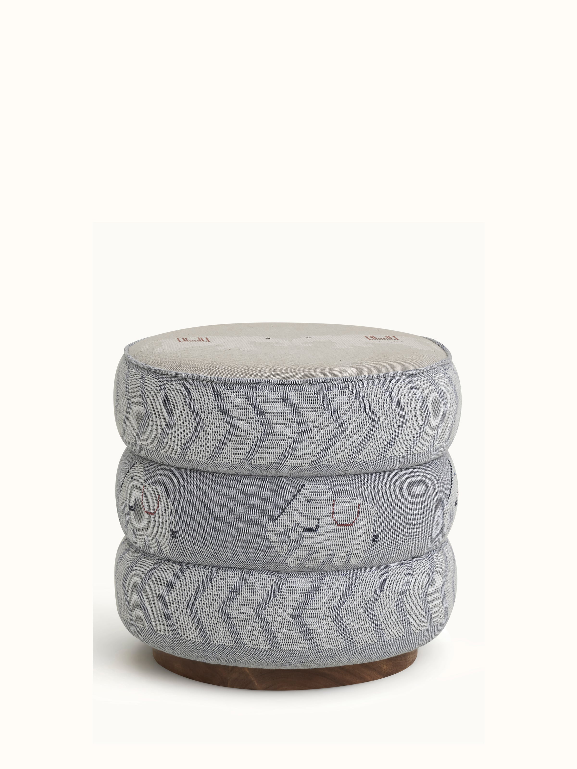 Front view of the upholstered Sheesham wood Bawan Buti pouffe, showing its detailed fabric pattern and wooden base