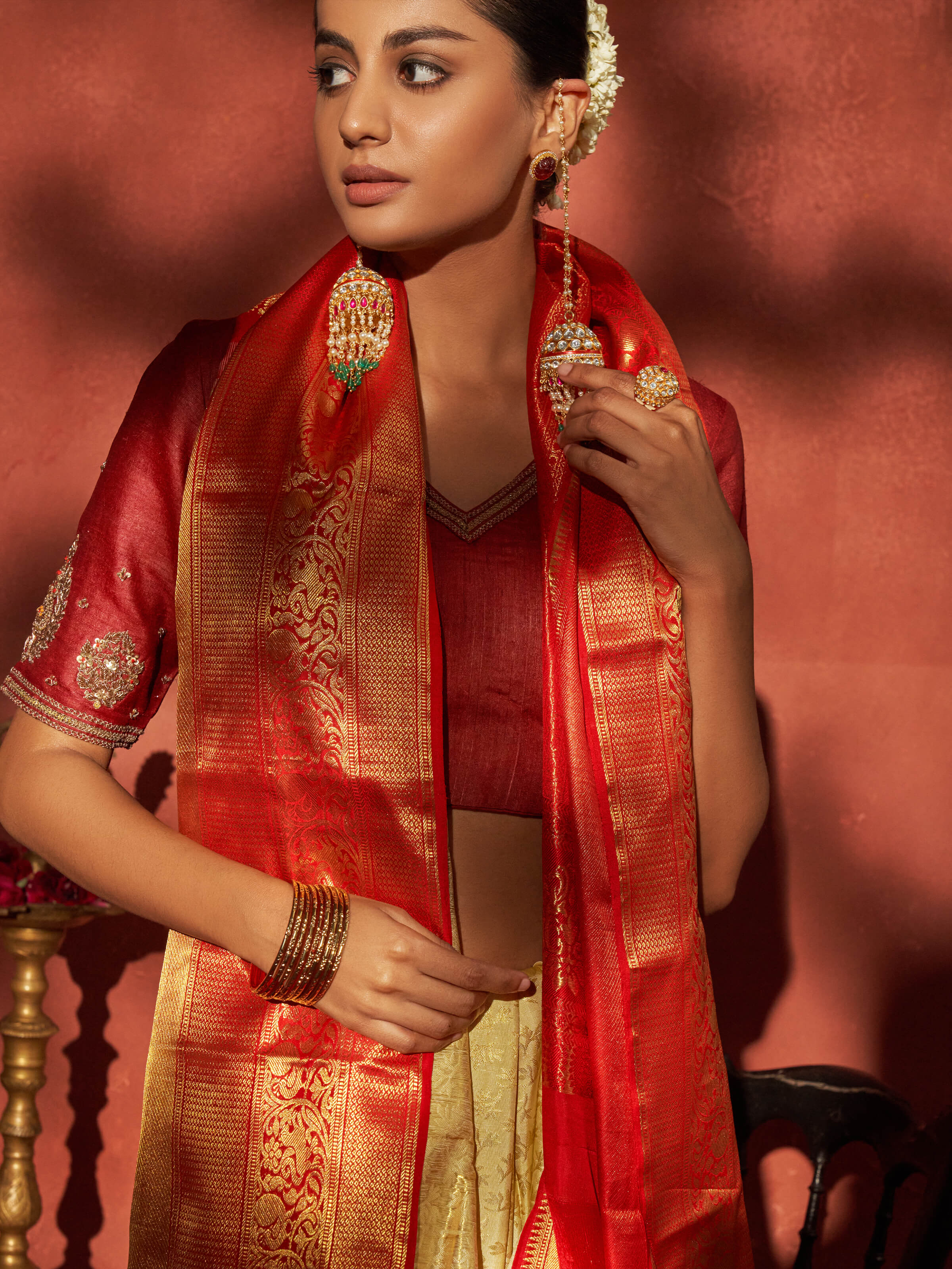 Detail view of off-white silk Dharmavaram saree highlighting fabric texture and weave