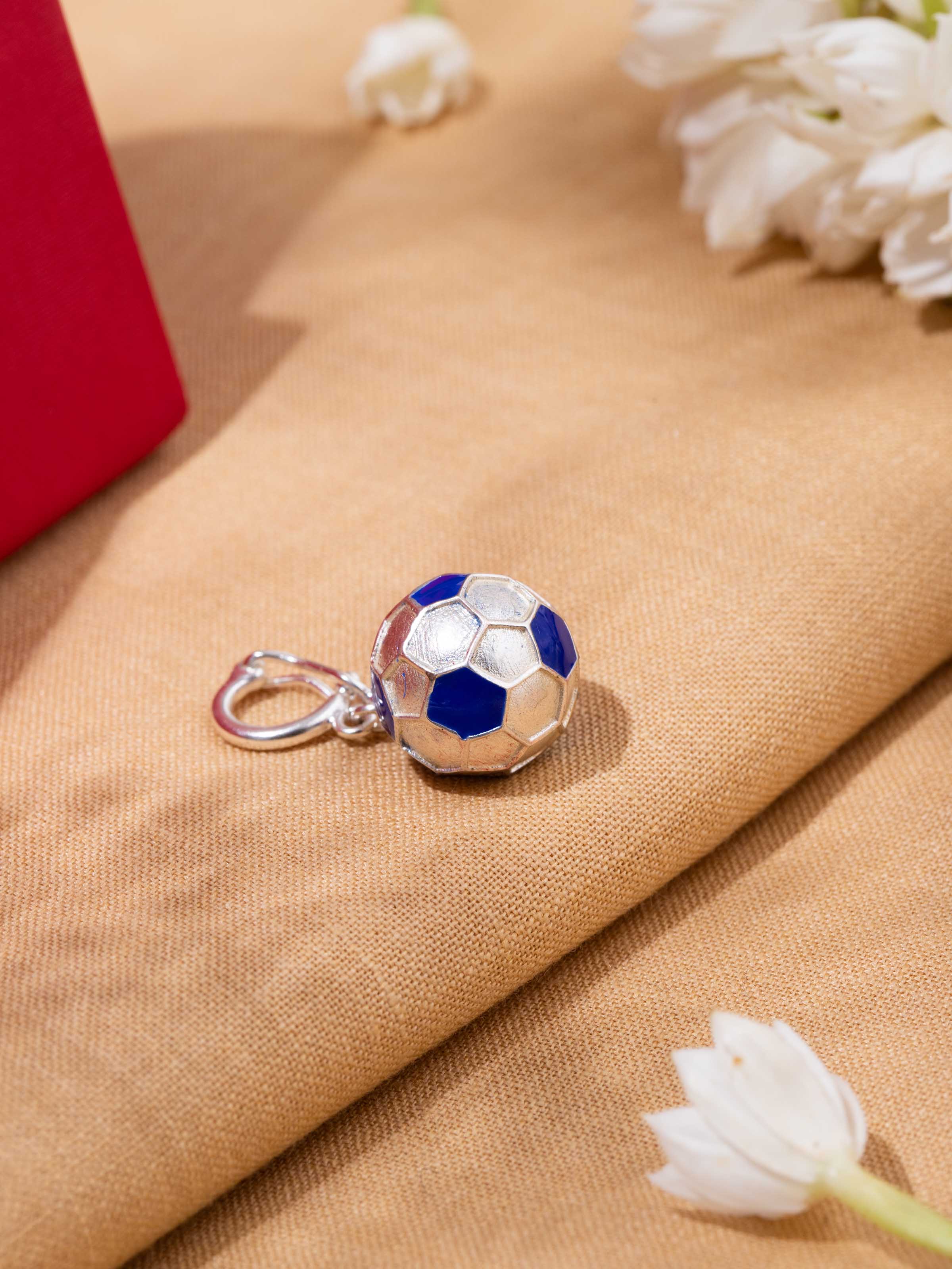 Close-up of oxidized silver pendant styled on neckline, showing artisanal design.