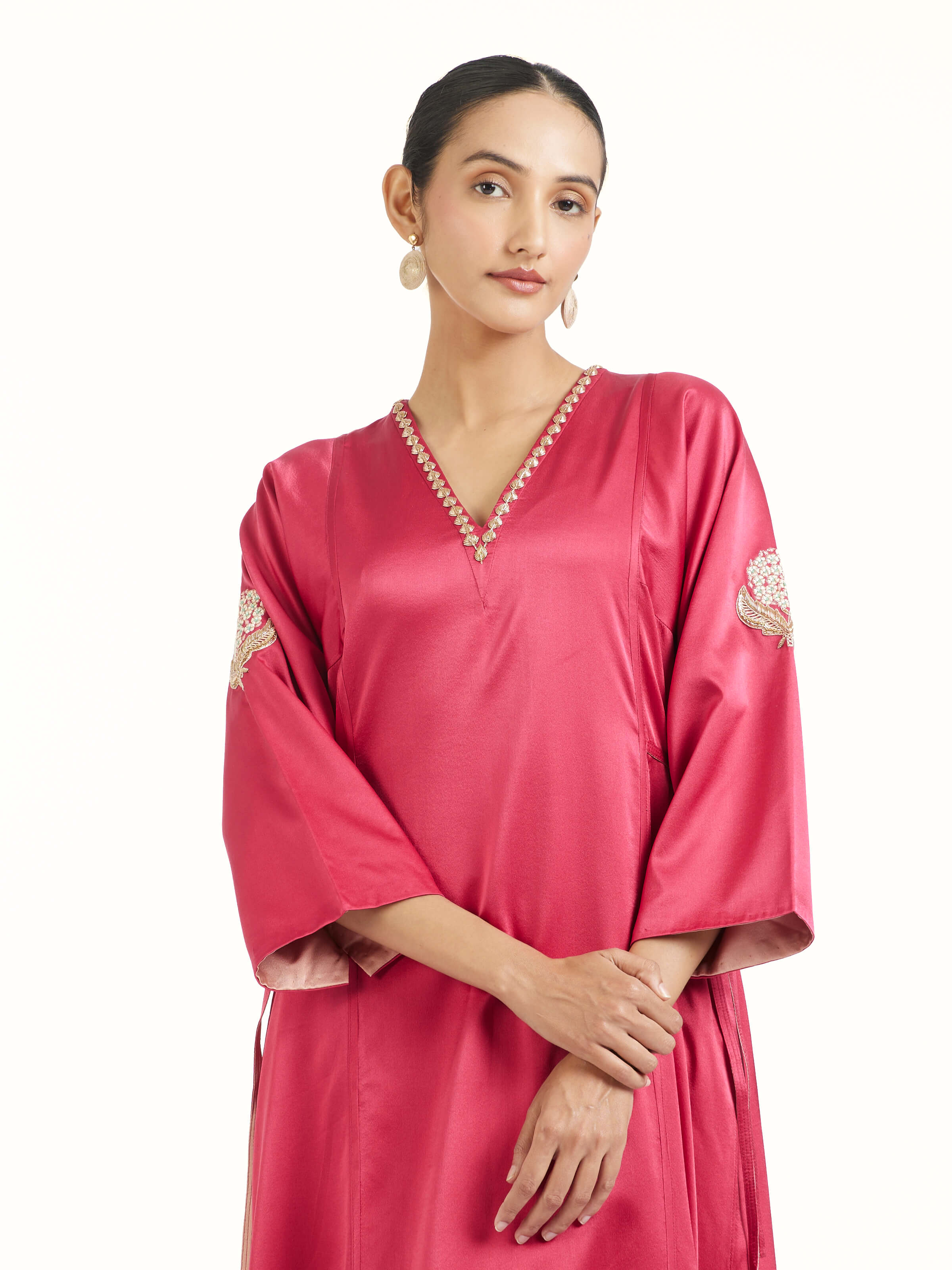 Angled view of berry silk Banarasi co-ord set emphasizing Banarasi weave