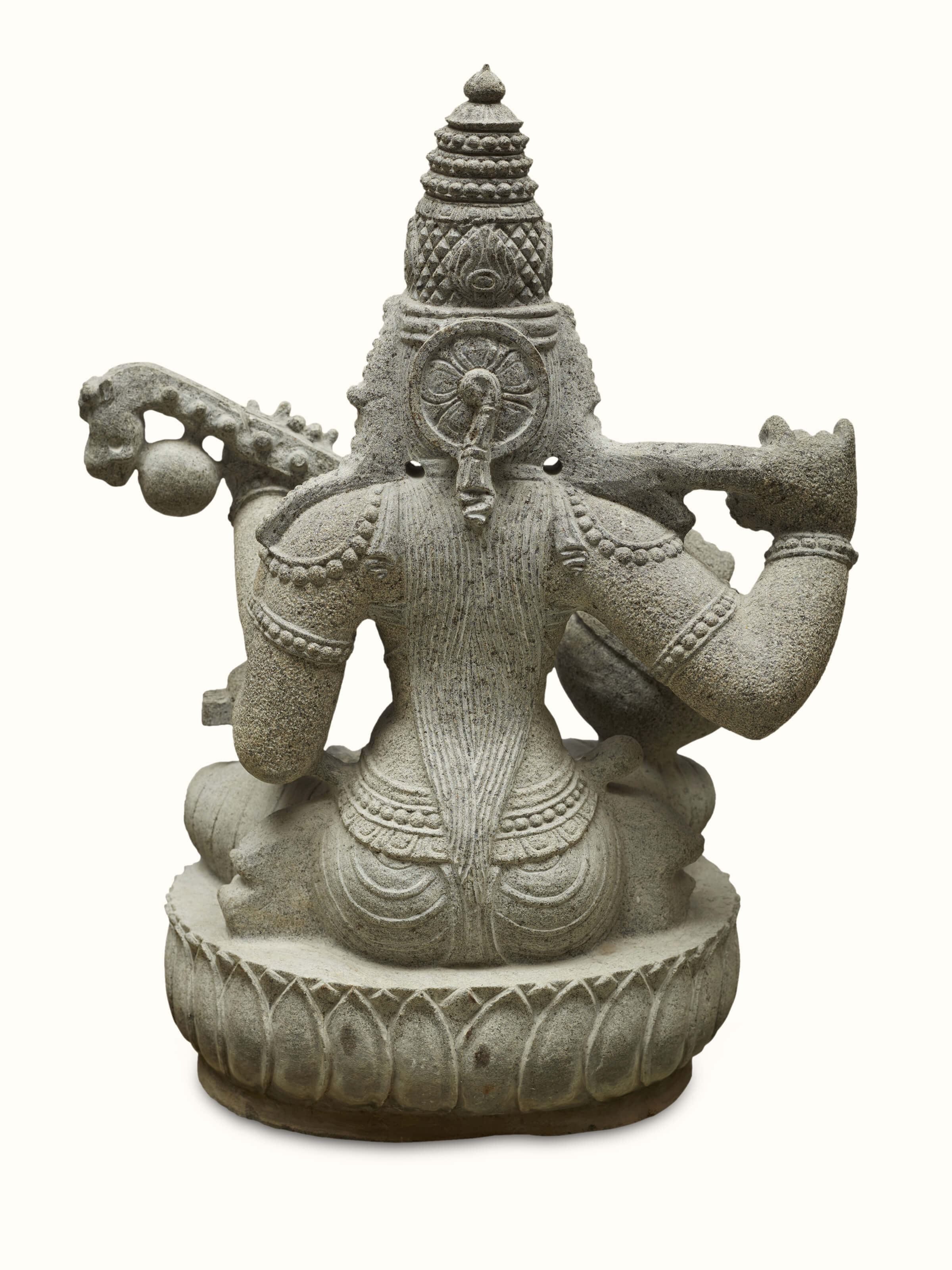 Full view of the carved stone goddess Saraswati idol, highlighting the overall design and artistic elegance.