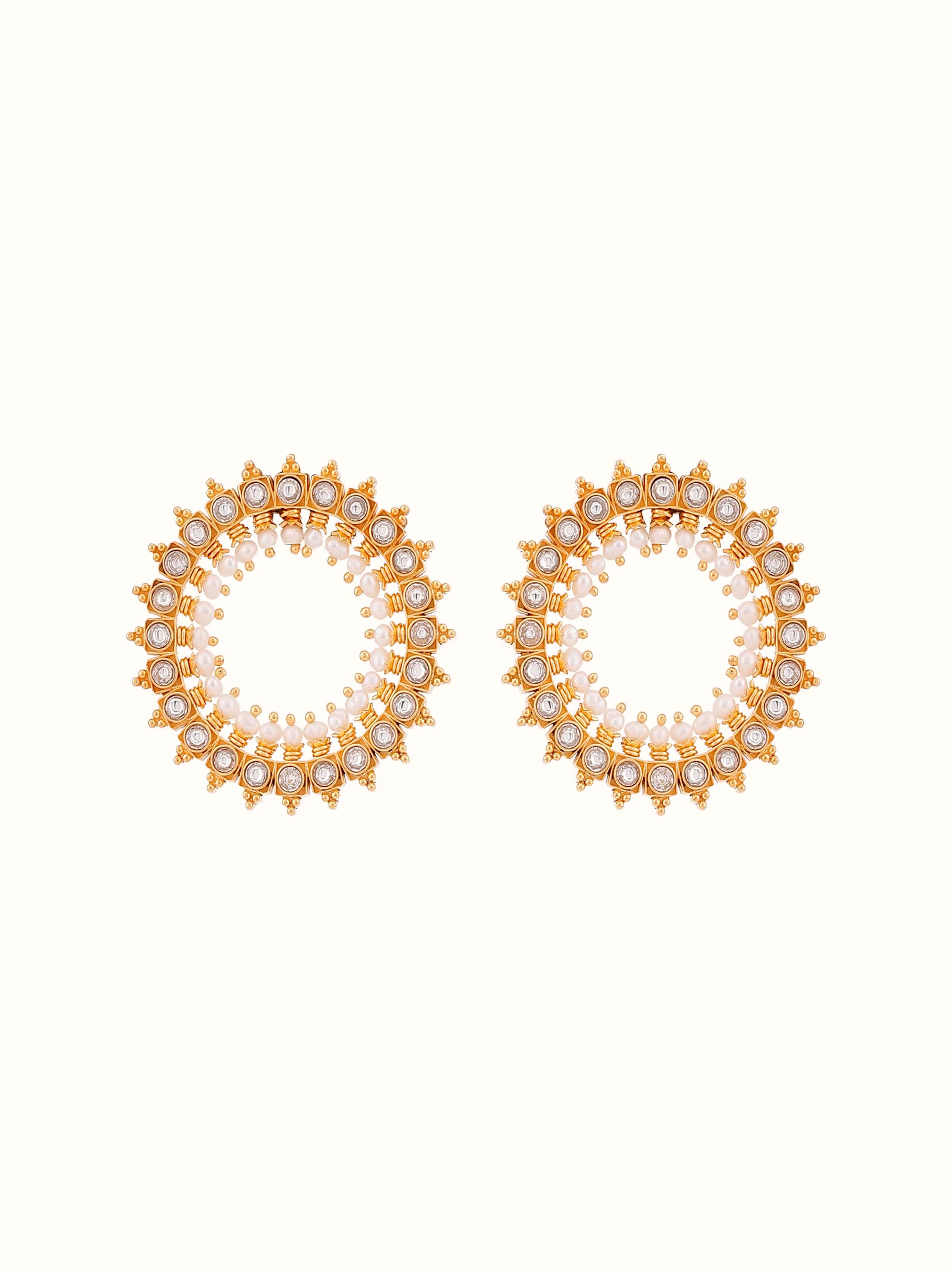 Front view of Guttapusalu silver studs featuring pearl clusters and traditional South Indian design.