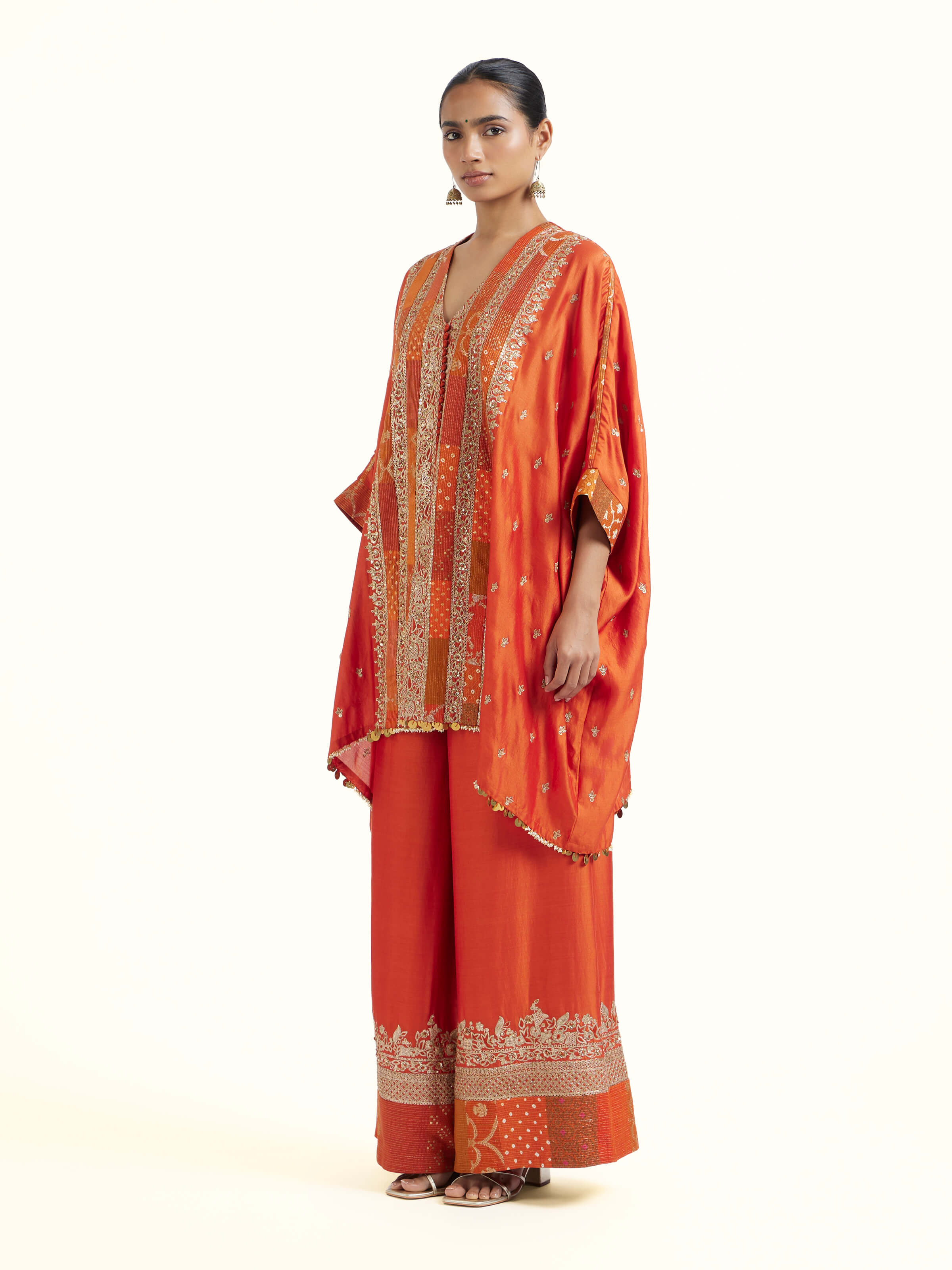 Side view of rust silk hand embroidery co-ord set showcasing coordinated fit