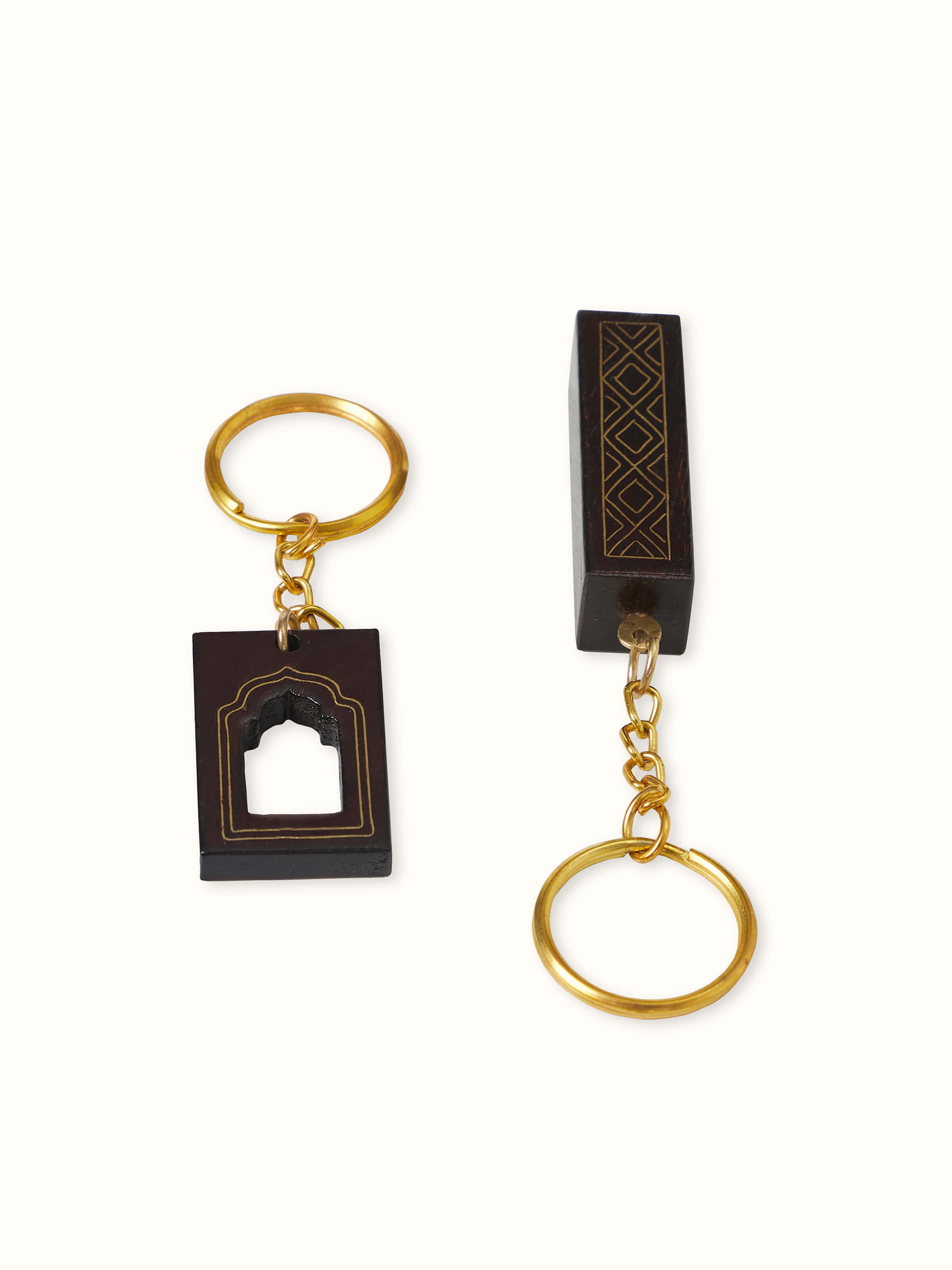 Front view of Tarkashi Sheesham Wood & Brass Arch Keychains by Swadesh, showcasing elegant craftsmanship and unique design.