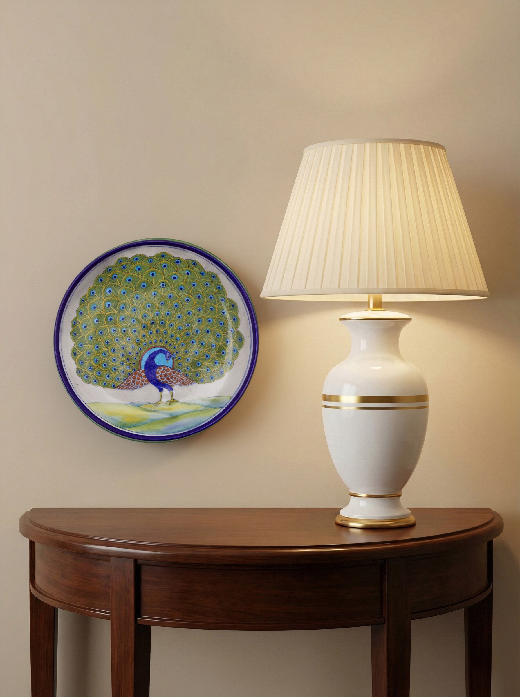 Lifestyle view of blue pottery peacock display plate handcrafted wall decor