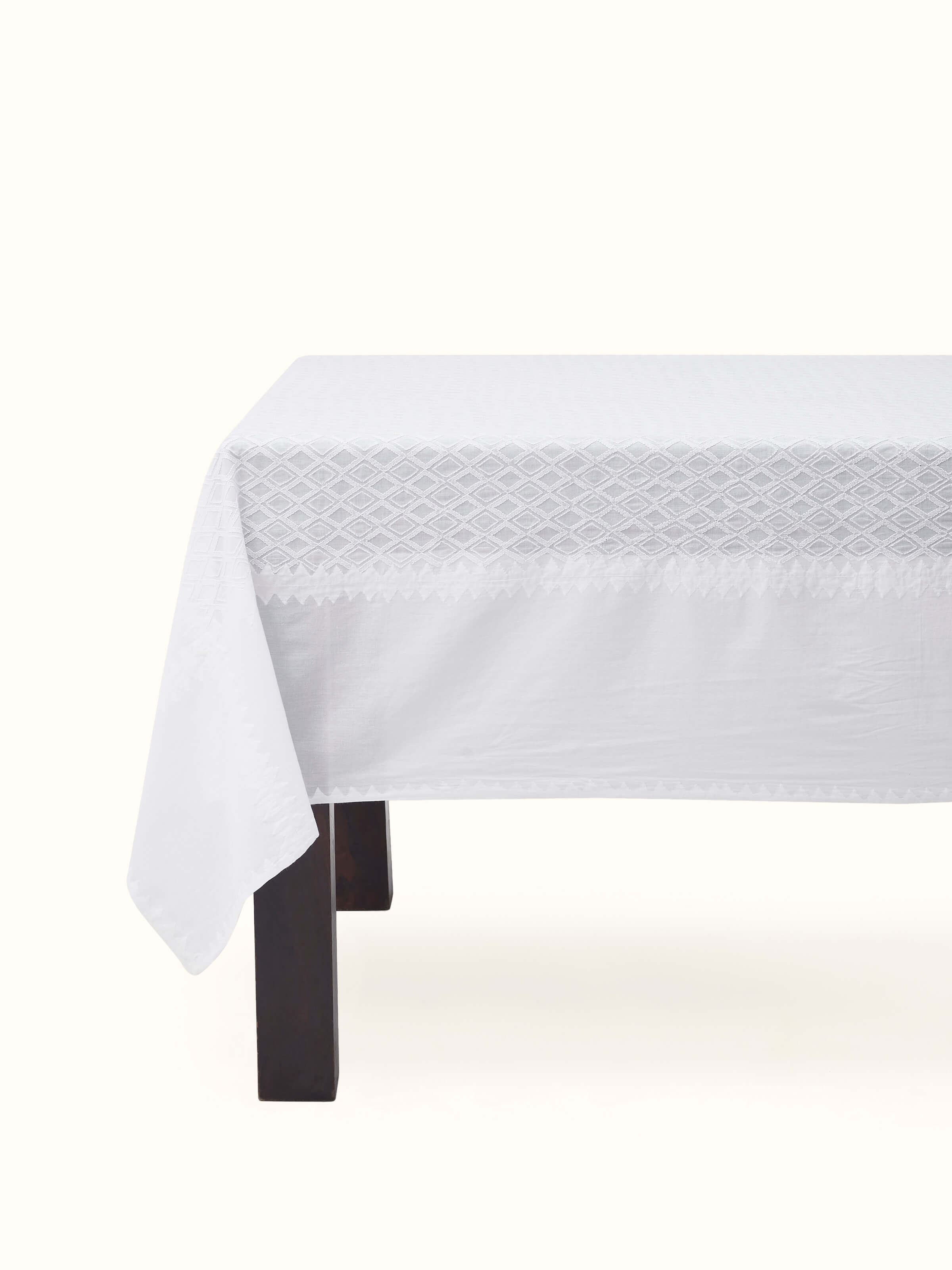 Front view of Ananda White Geometric Cotton Chikankari Hand Embroidery Table Cover for 6-seater by Swadesh