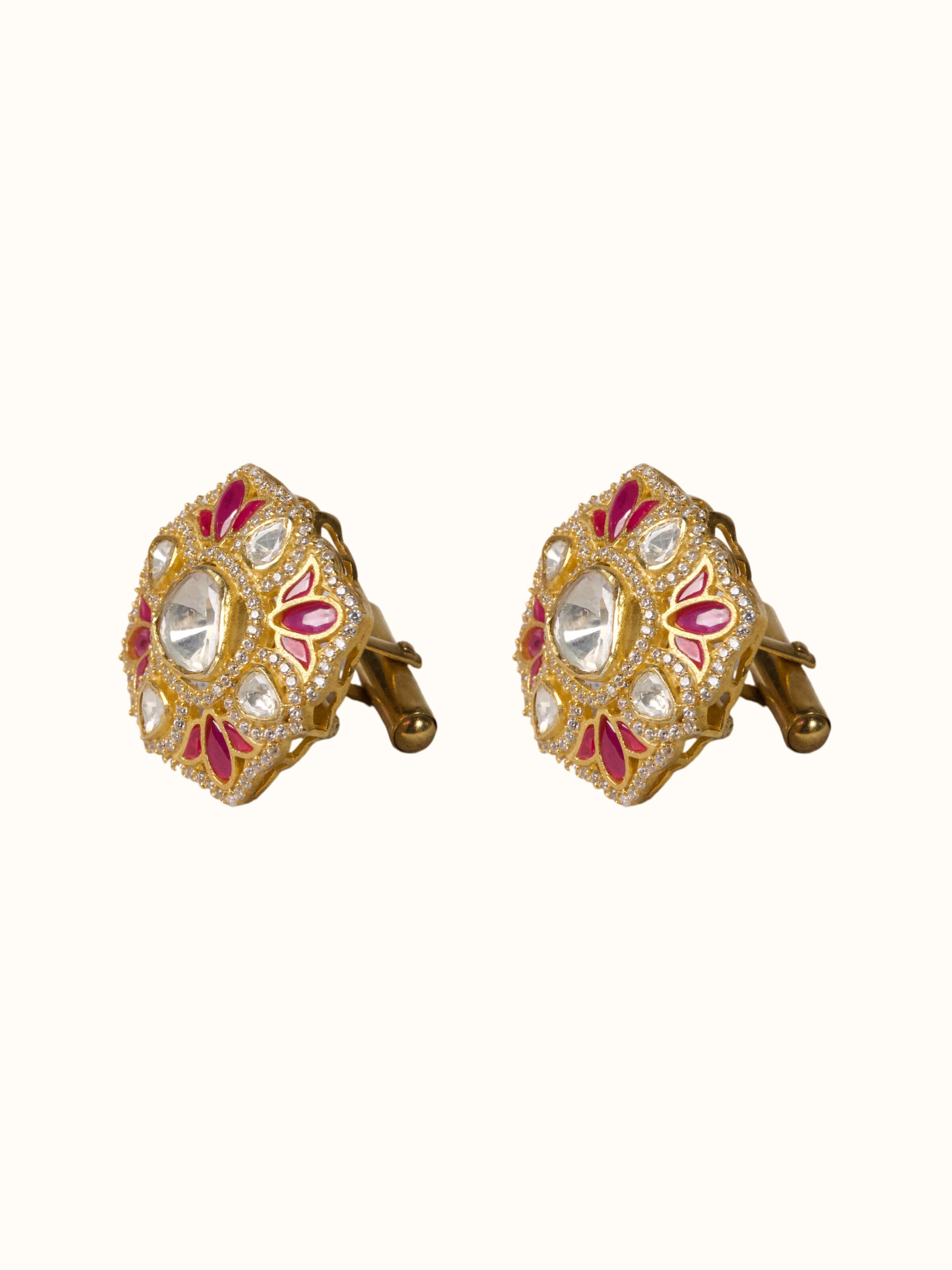angled view of silver smithing gold plated cufflinks set