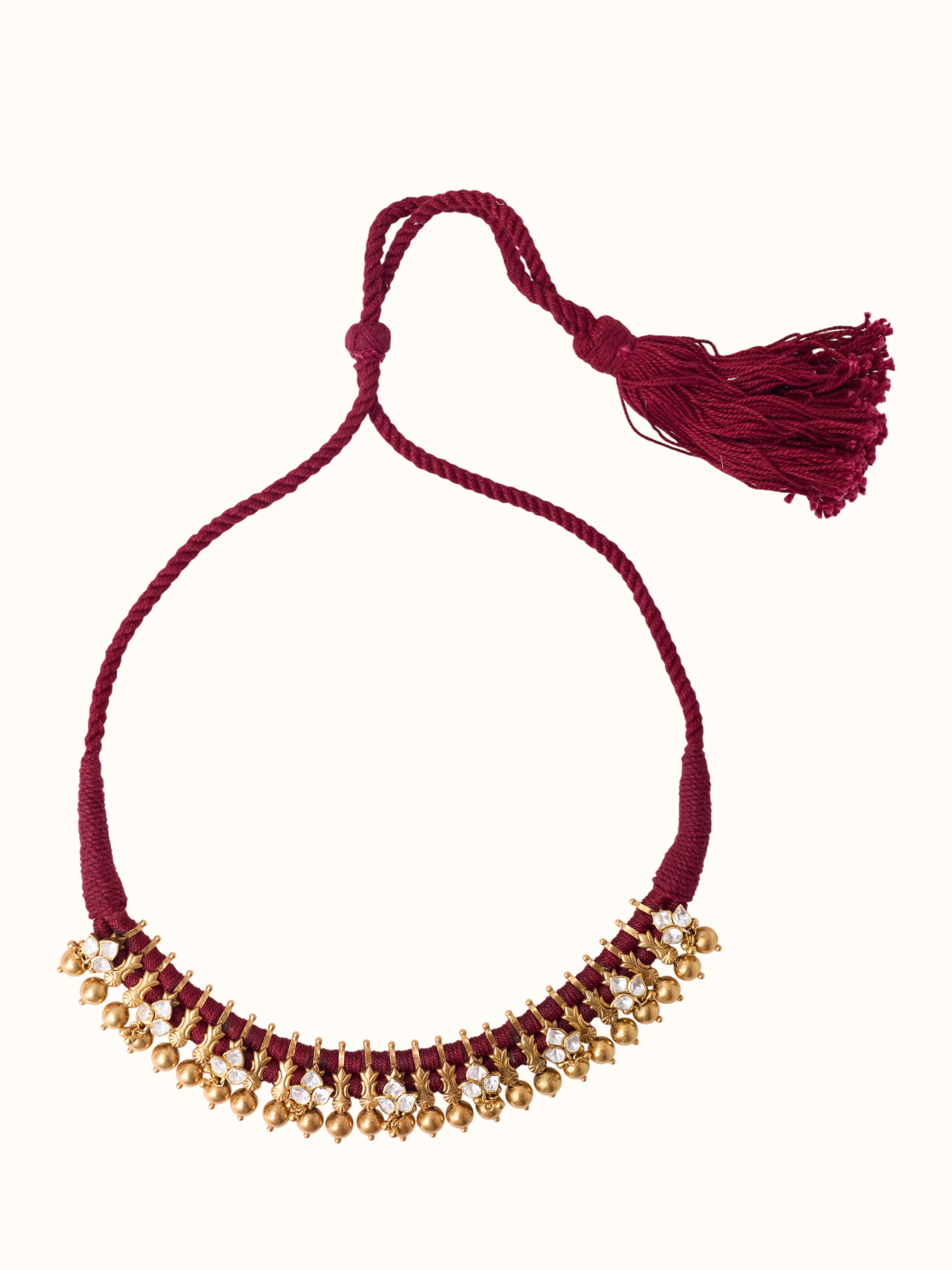 front view of silver smithing gold plated collar necklace with statement design
