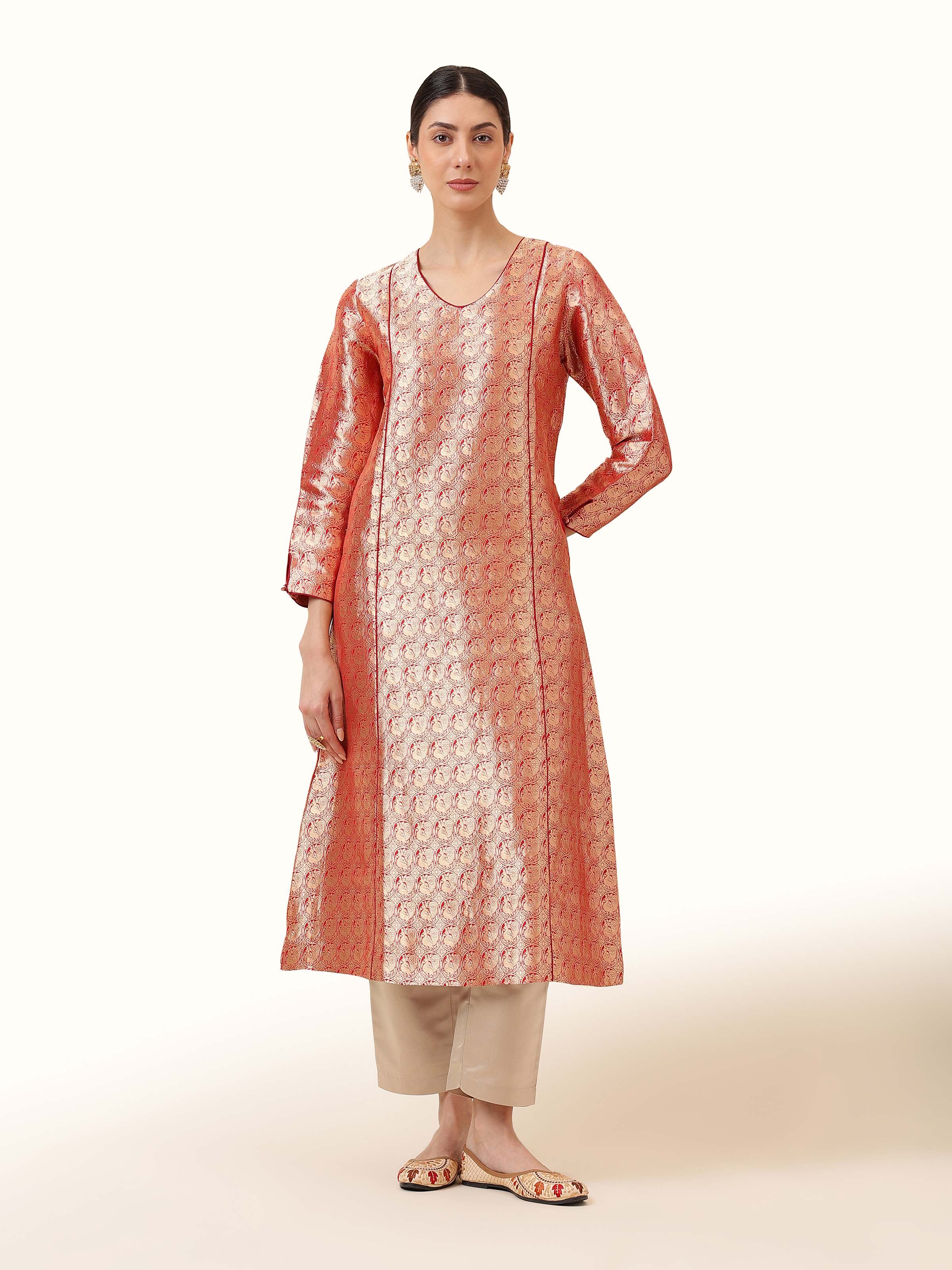 Red Silk Banarasi Kurta worn by model in front-facing pose, showcasing rich brocade weave and traditional silhouette.