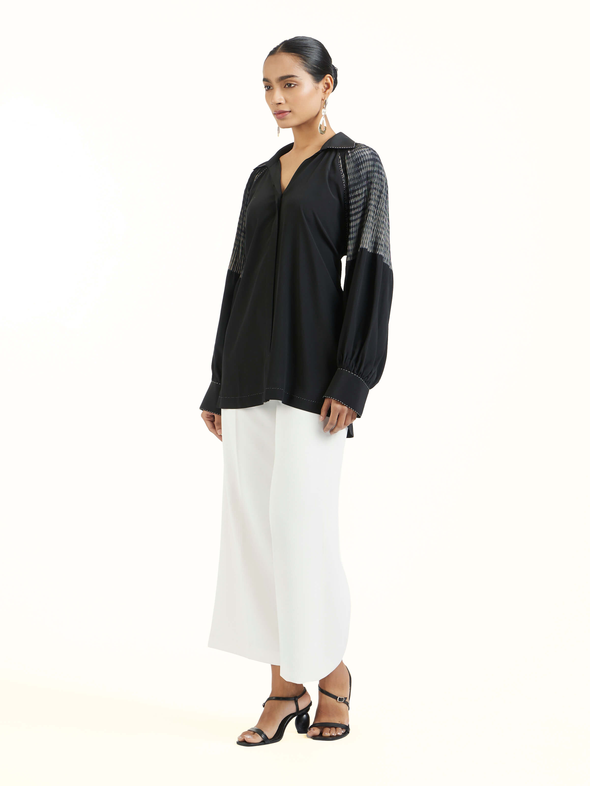 Side view highlighting drape and fit