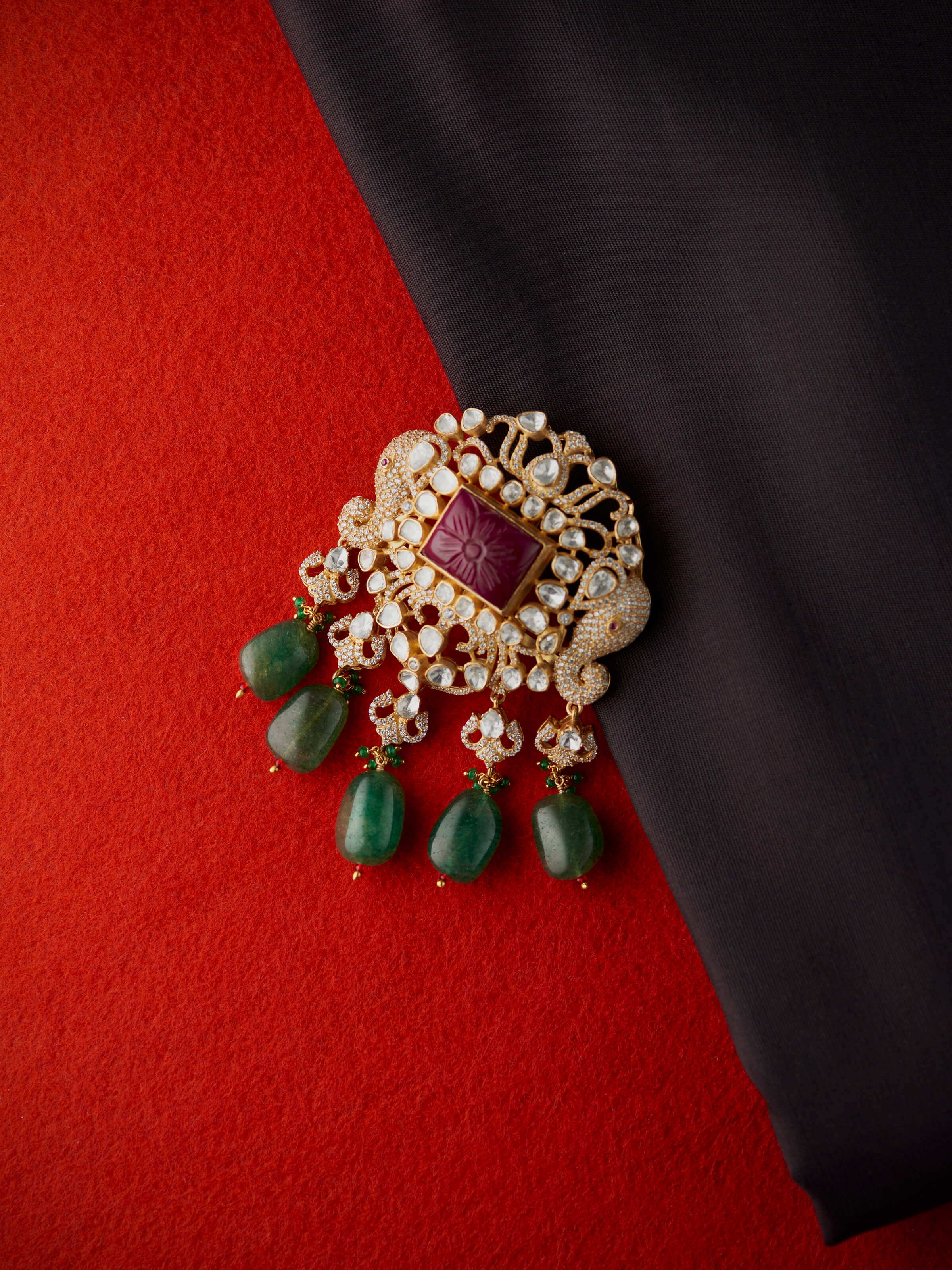 lifestyle view of silver smithing yellow gold brooch pin