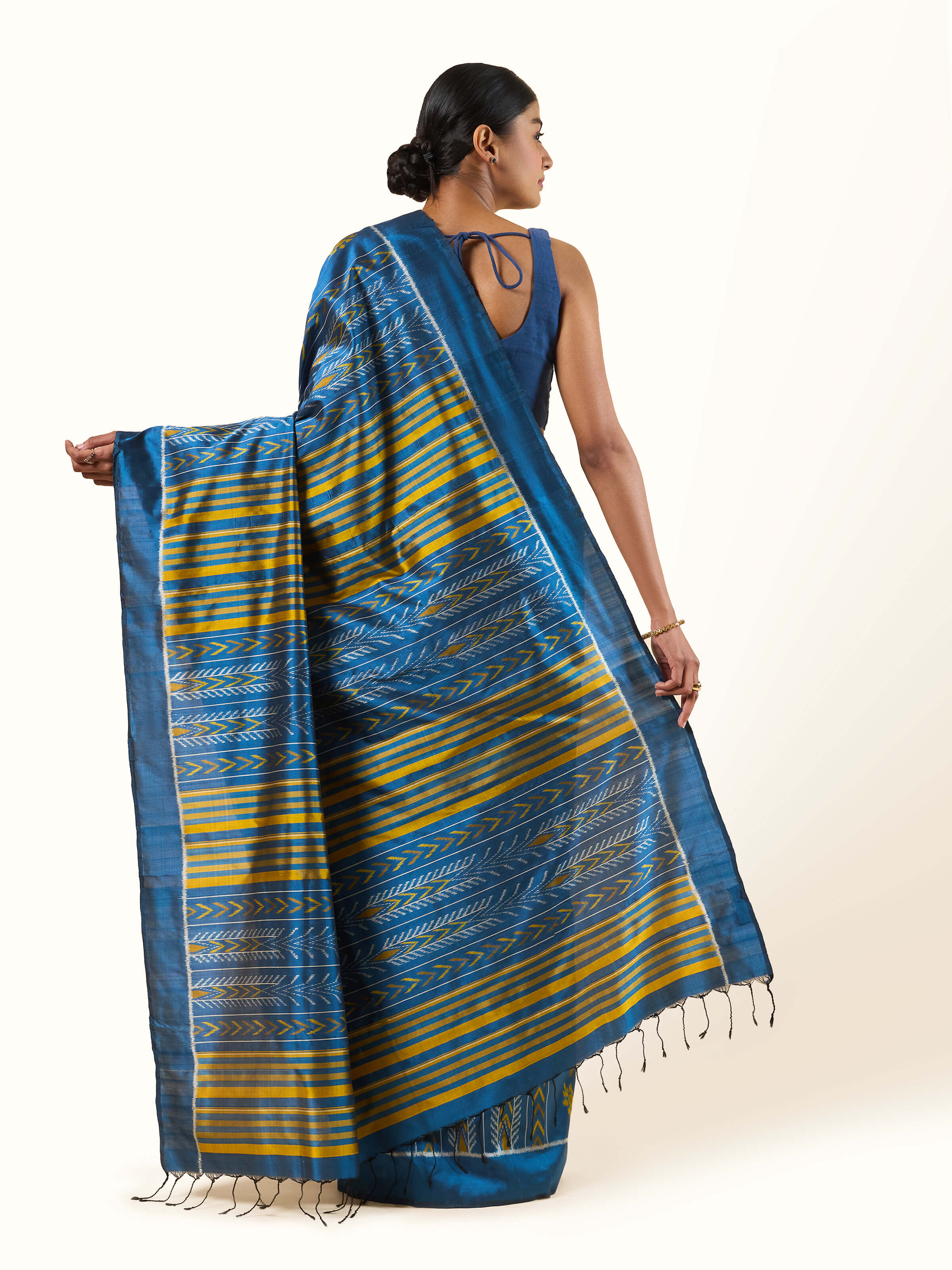 Front view of Blue Mulberry Silk Odisha Ikat Saree emphasizing its traditional ikat weave.