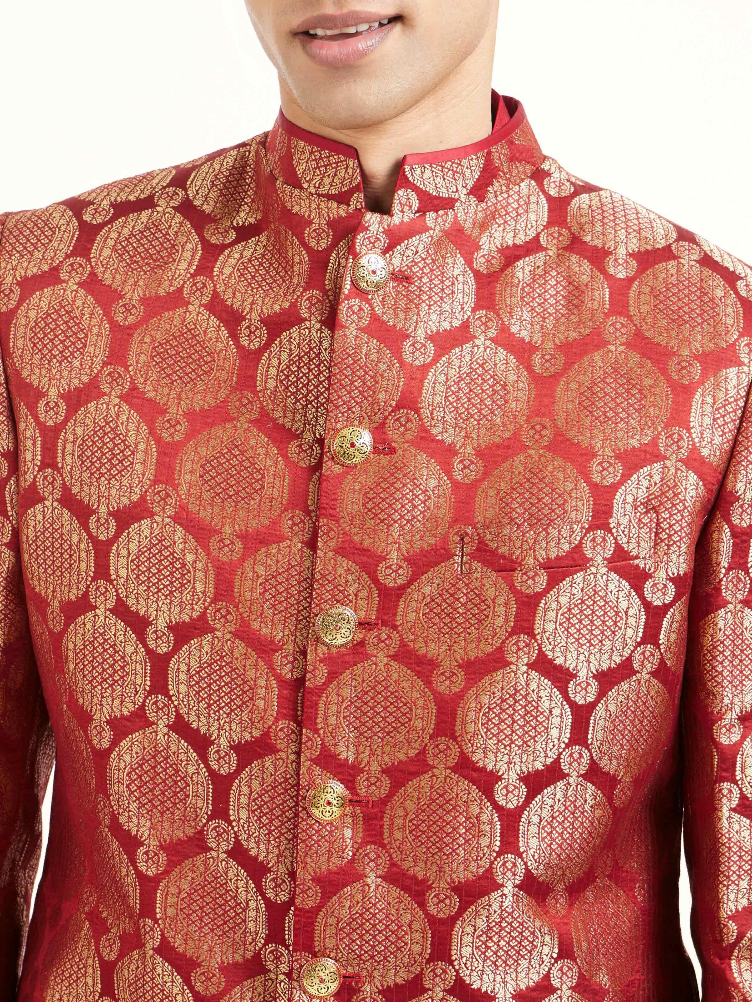 Detail view of maroon silk Banarasi butidar sherwani highlighting fabric texture and buti work