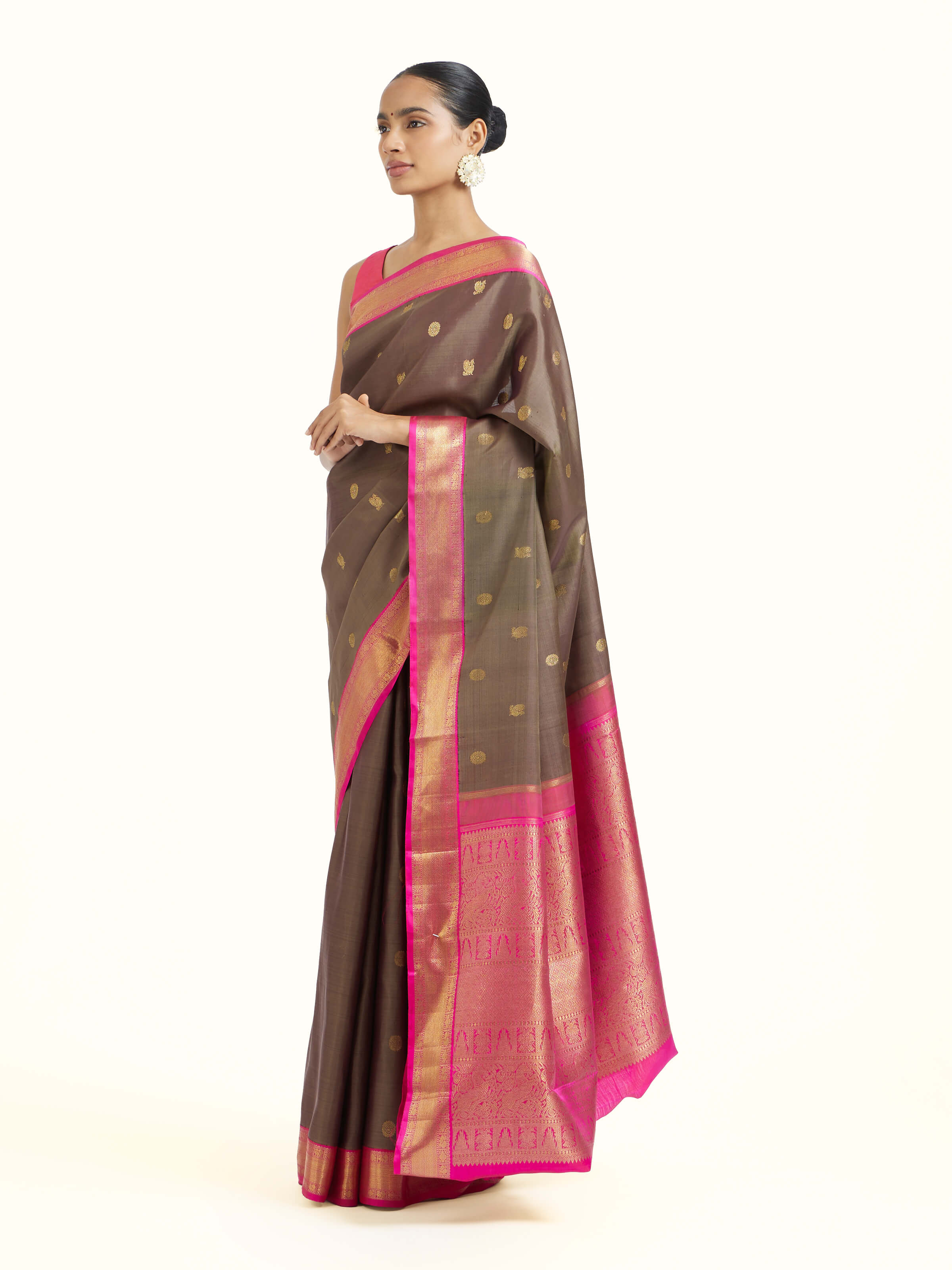Side view of dark grey silk Kancheepuram saree showcasing elegant drape
