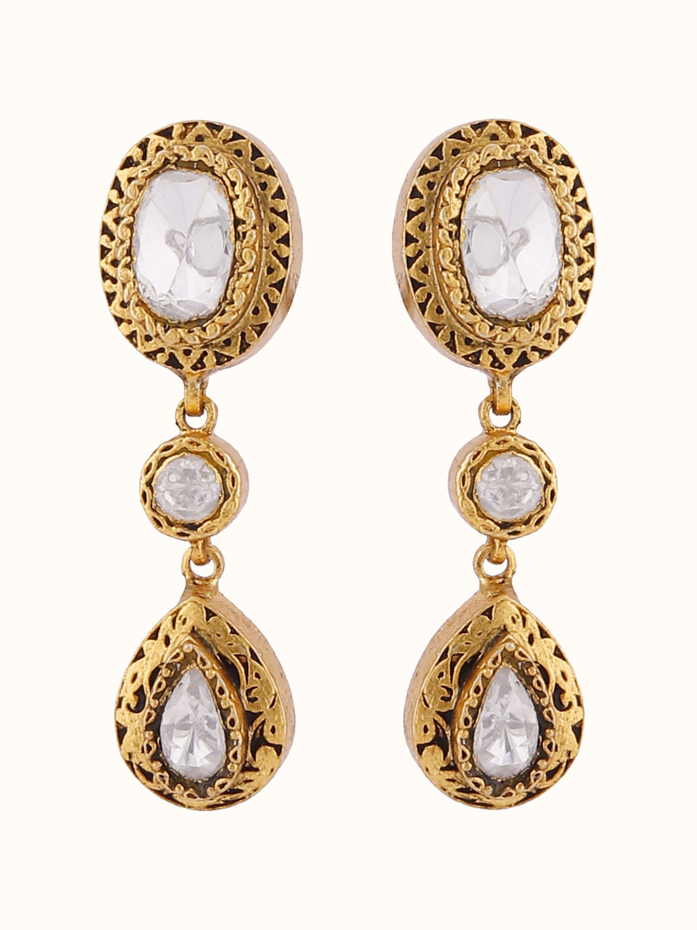 Front view capturing the delicate drops earring style in silver