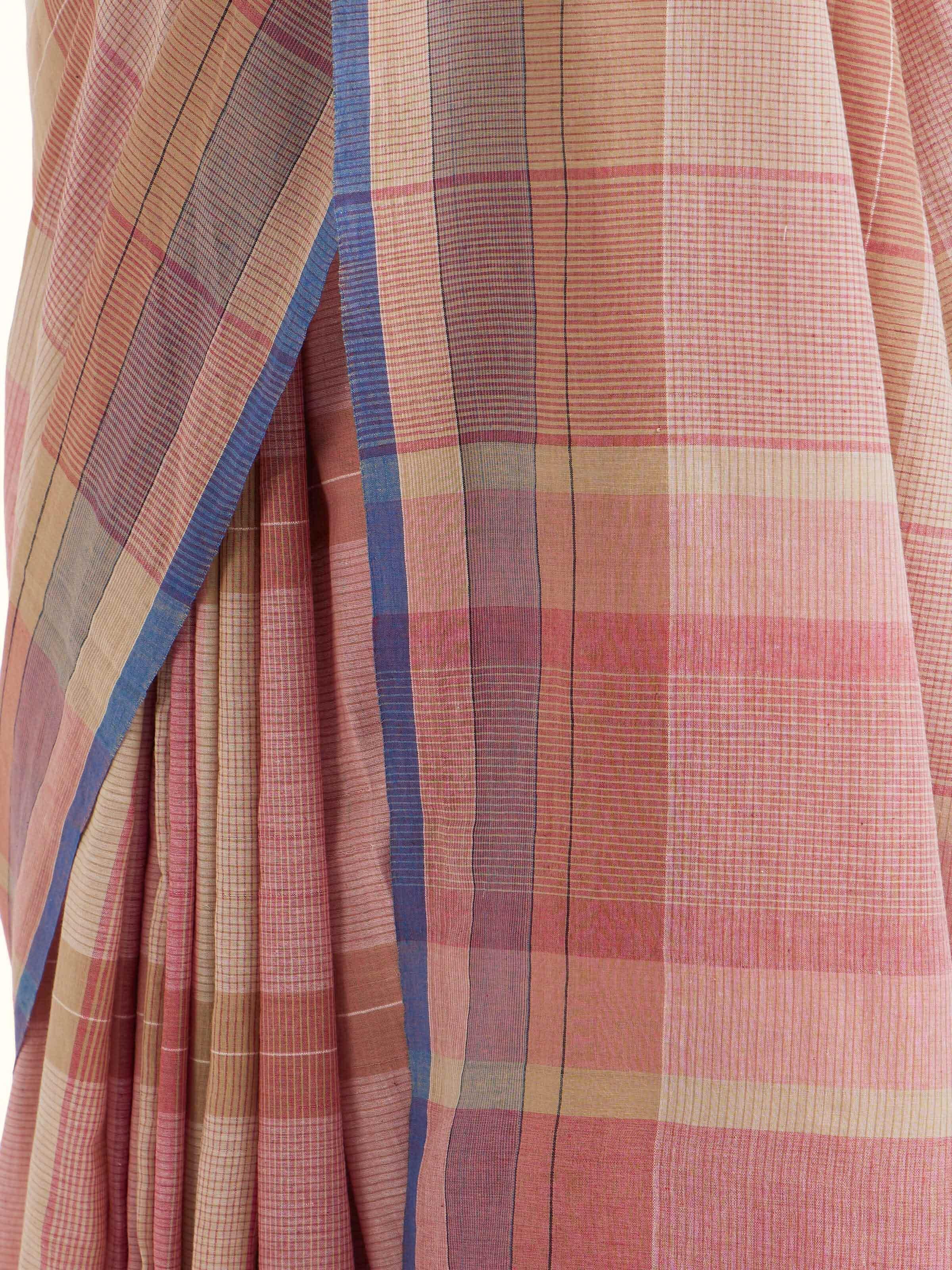 Detail view of brown cotton Bengal Jamdani saree showing handwoven texture